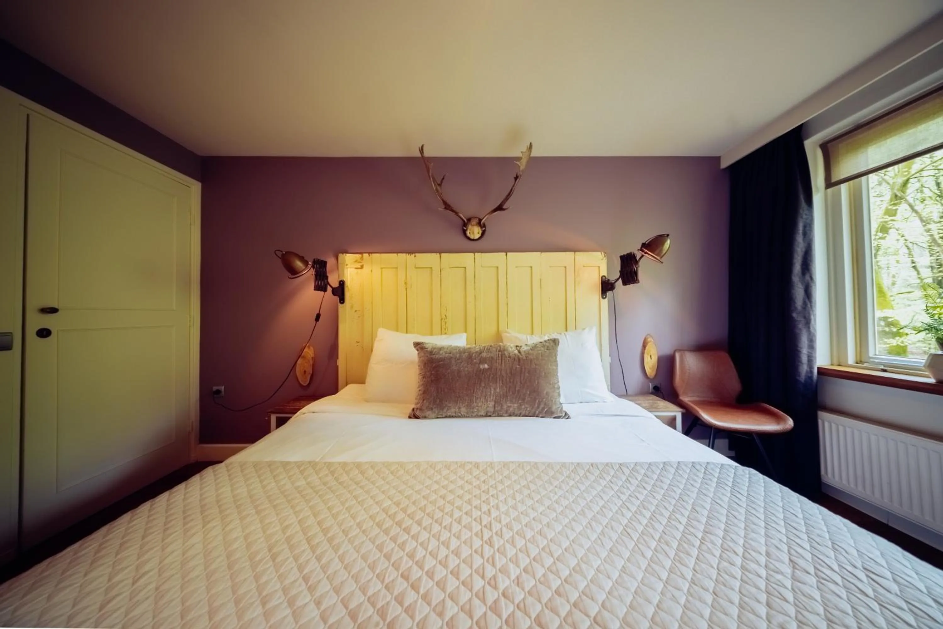 Bed in Hotel & Restaurant Meneer Van Eijck