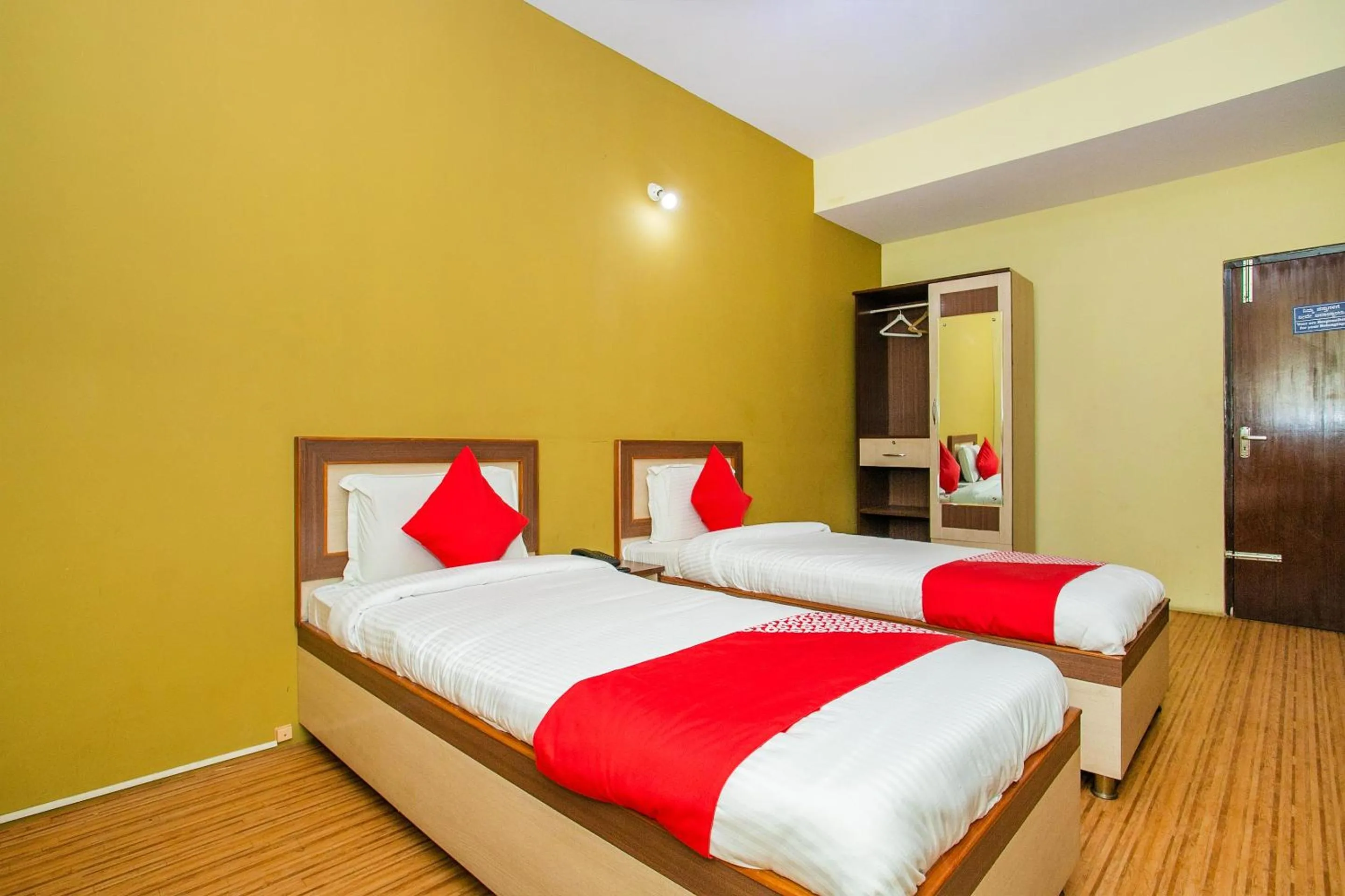 Bedroom in Hotel O by OYO Alankar Residency