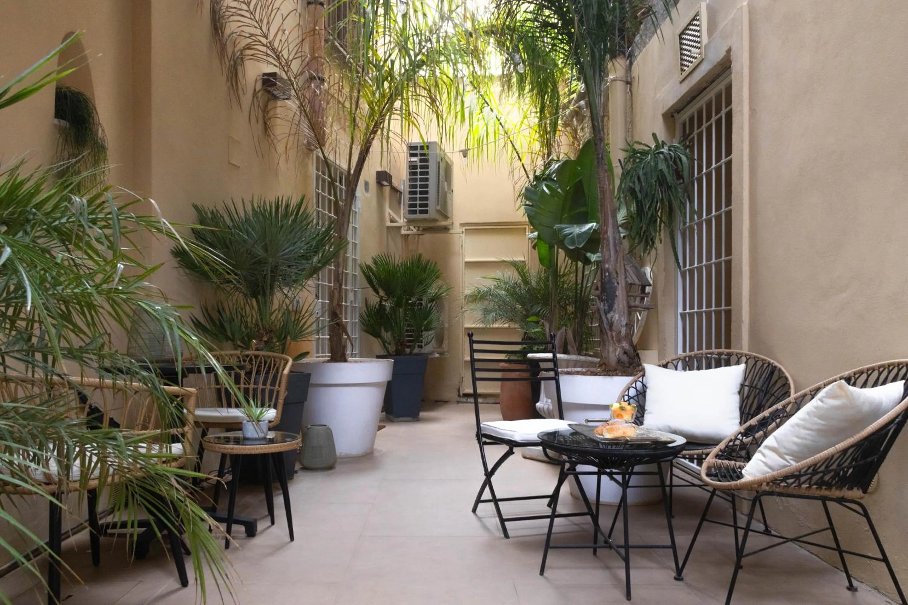 Patio in Palazzo Natoli Boutique Hotel