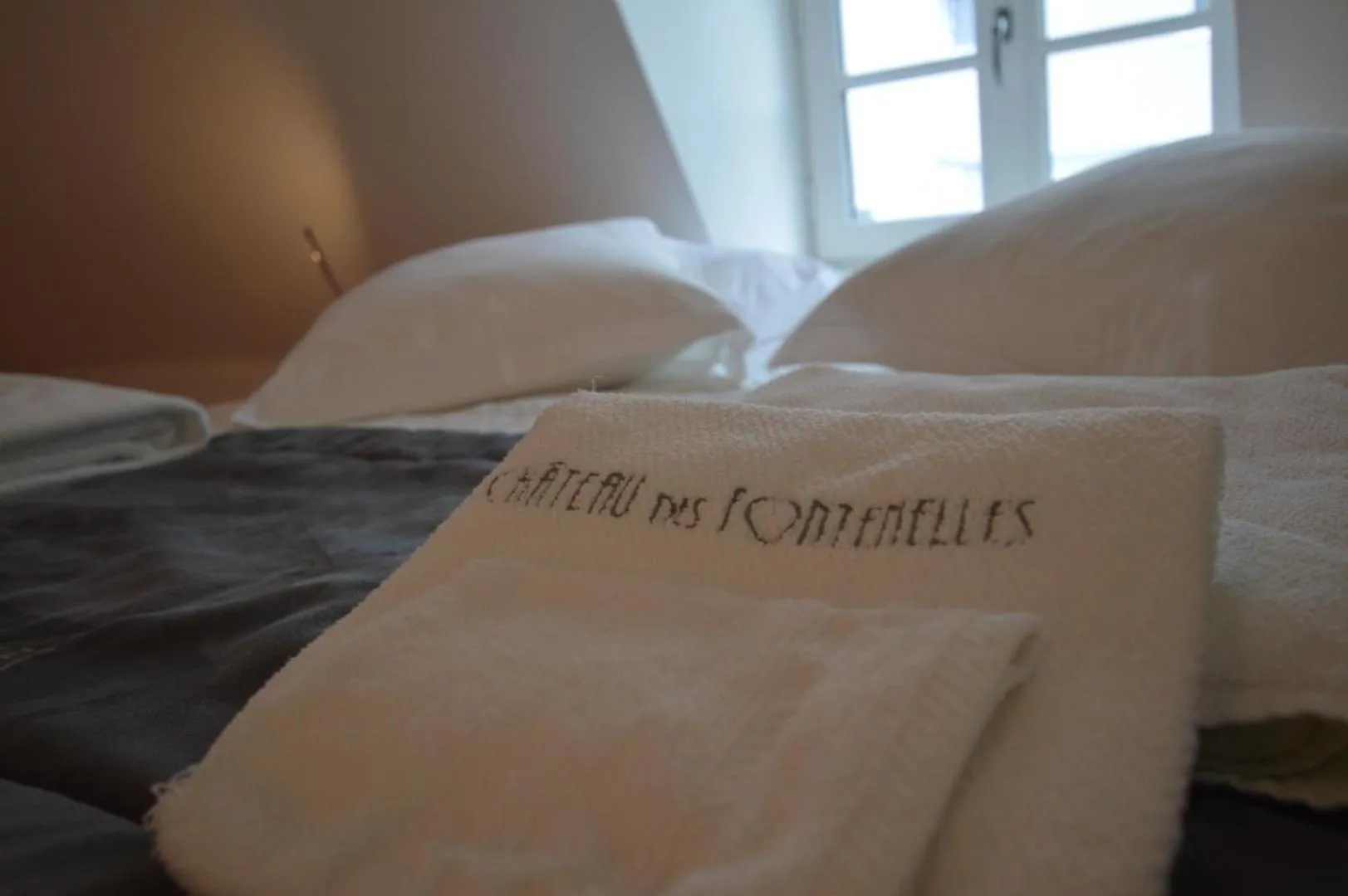 towels, Bed in Chateau des Fontenelles