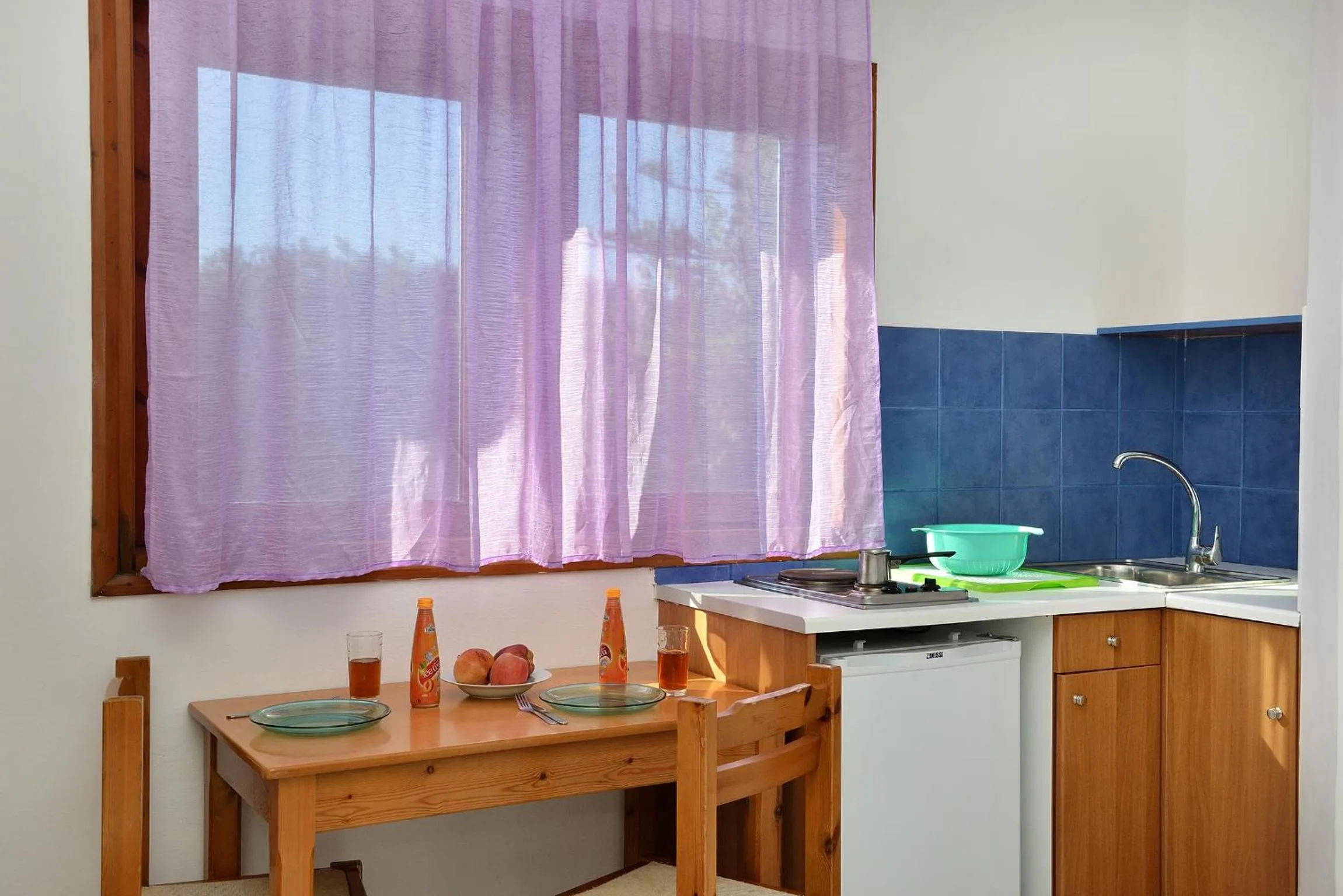 Kitchen or kitchenette in San Antonio Apartments