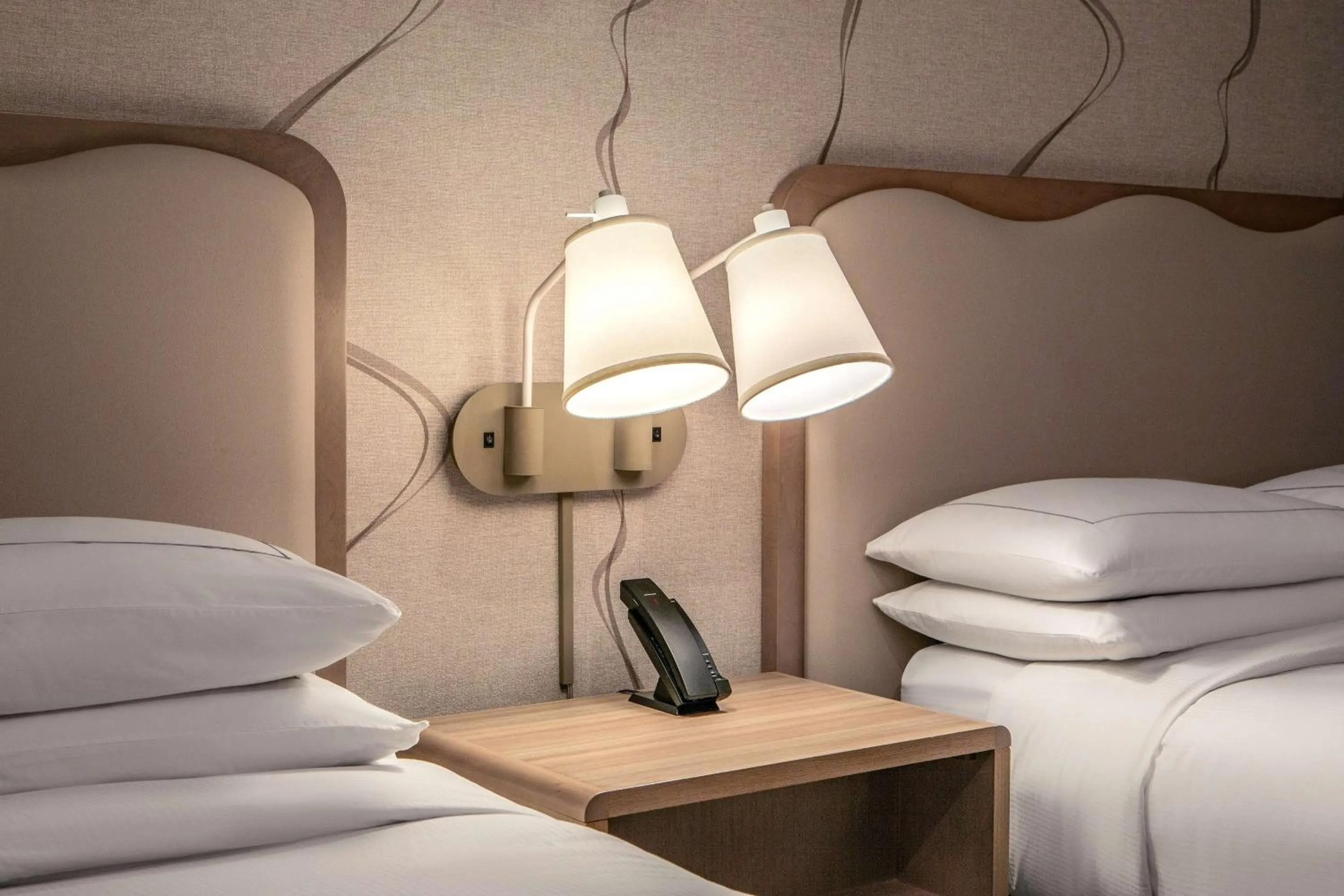 Bed in DoubleTree by Hilton Hotel and Conference Center Chicago North Shore