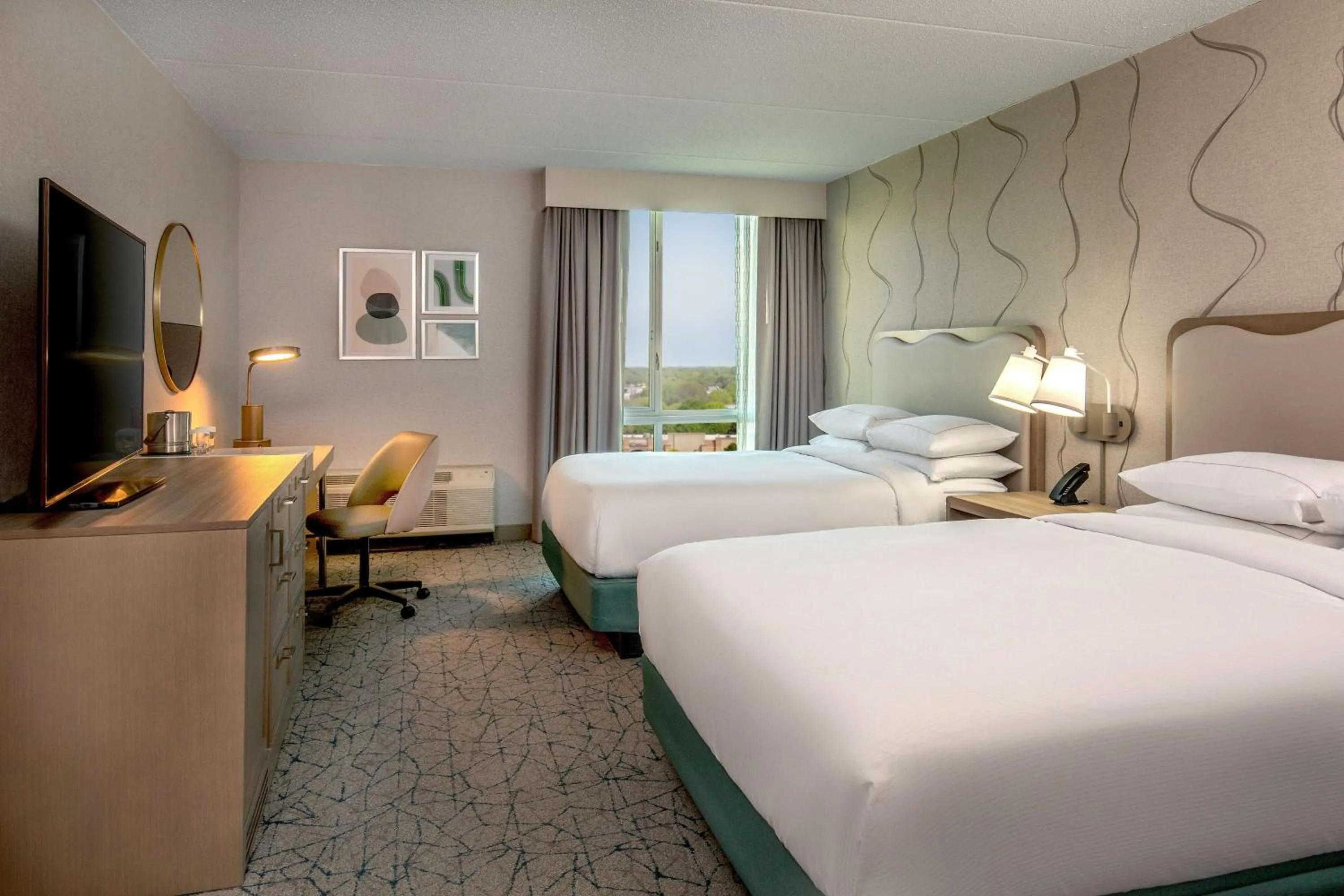 Bed in DoubleTree by Hilton Hotel and Conference Center Chicago North Shore