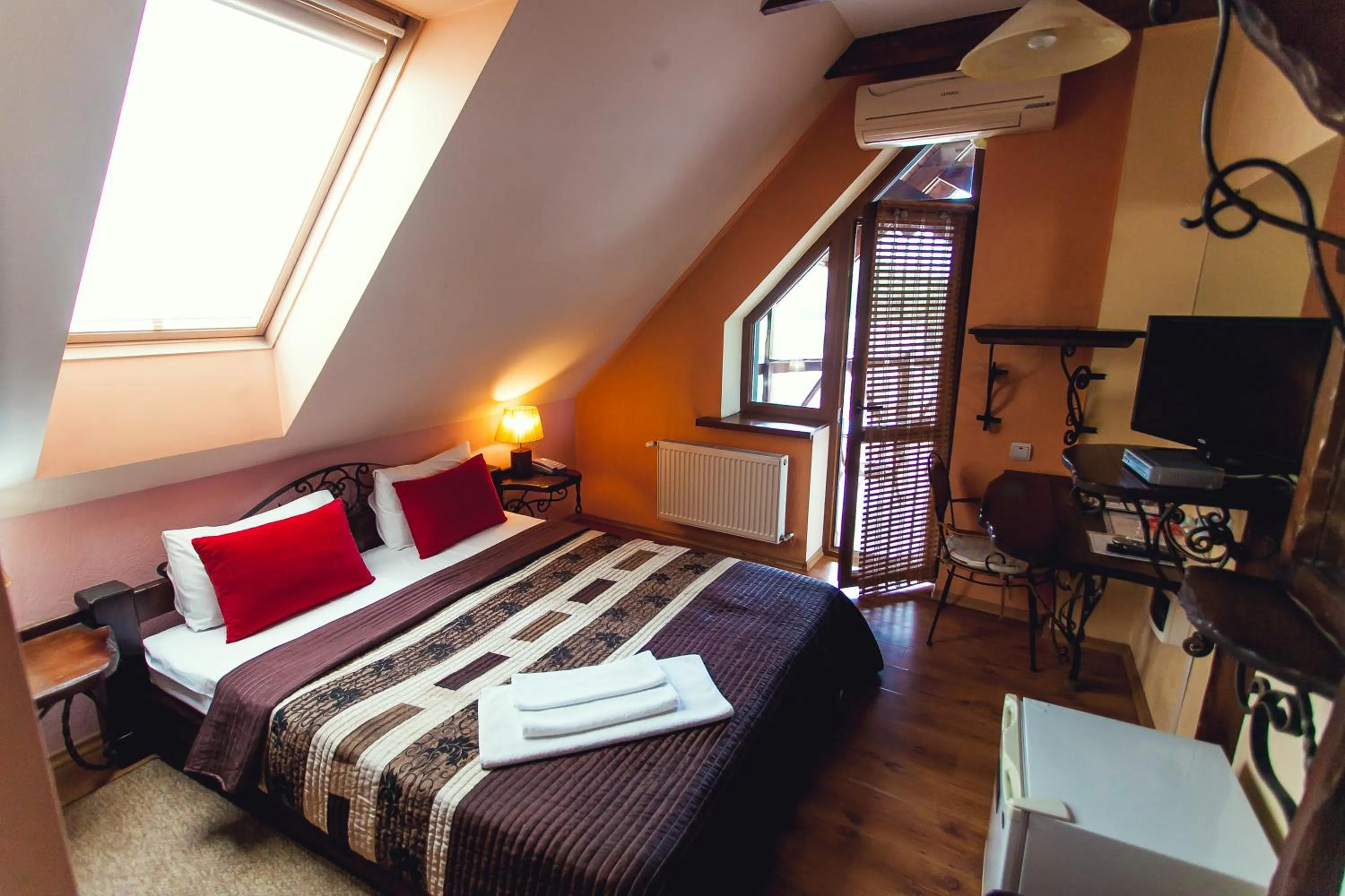 Bed in Art-Rustic Boutique Hotel
