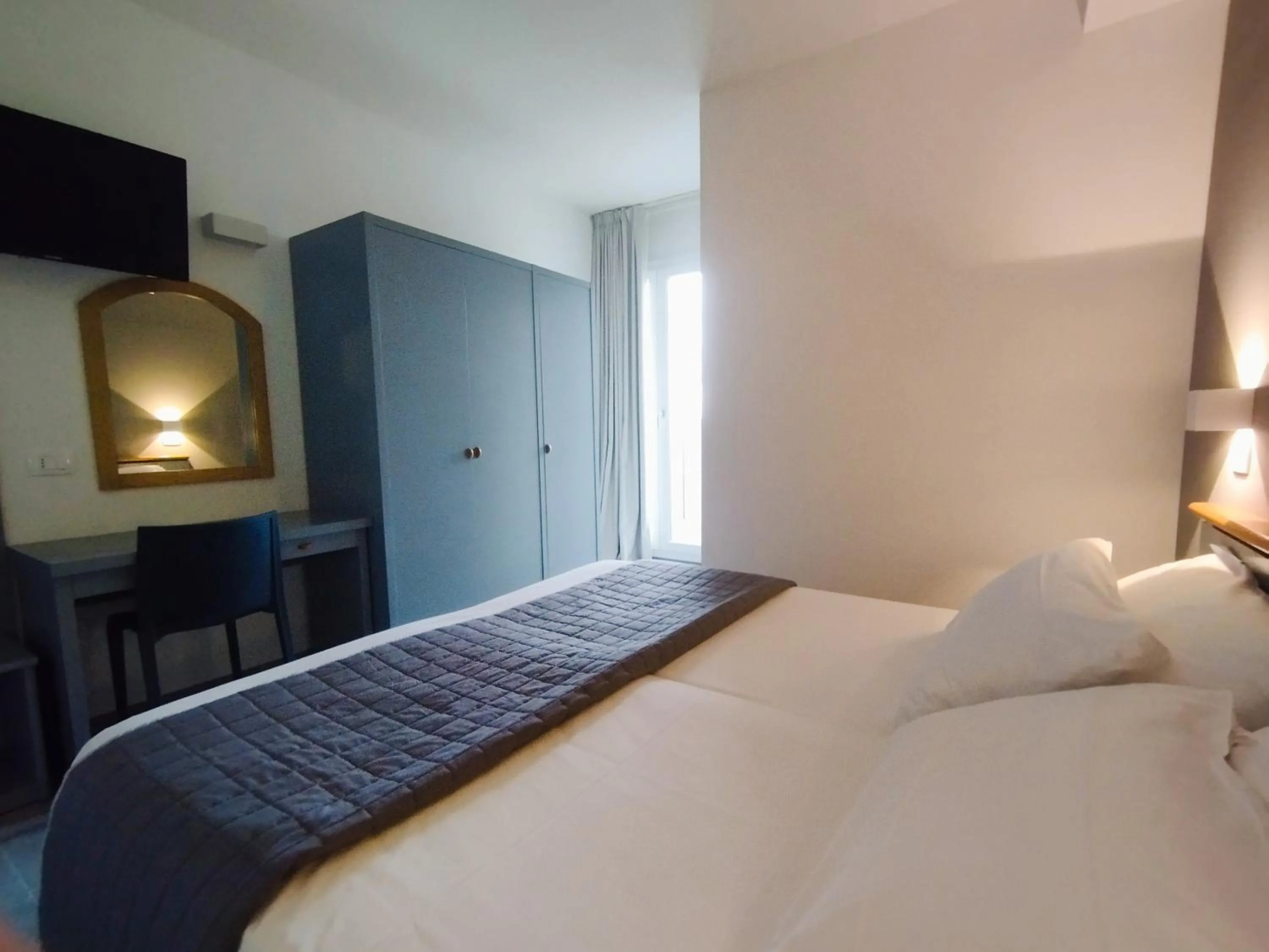 Bed in Hotel Excelsior