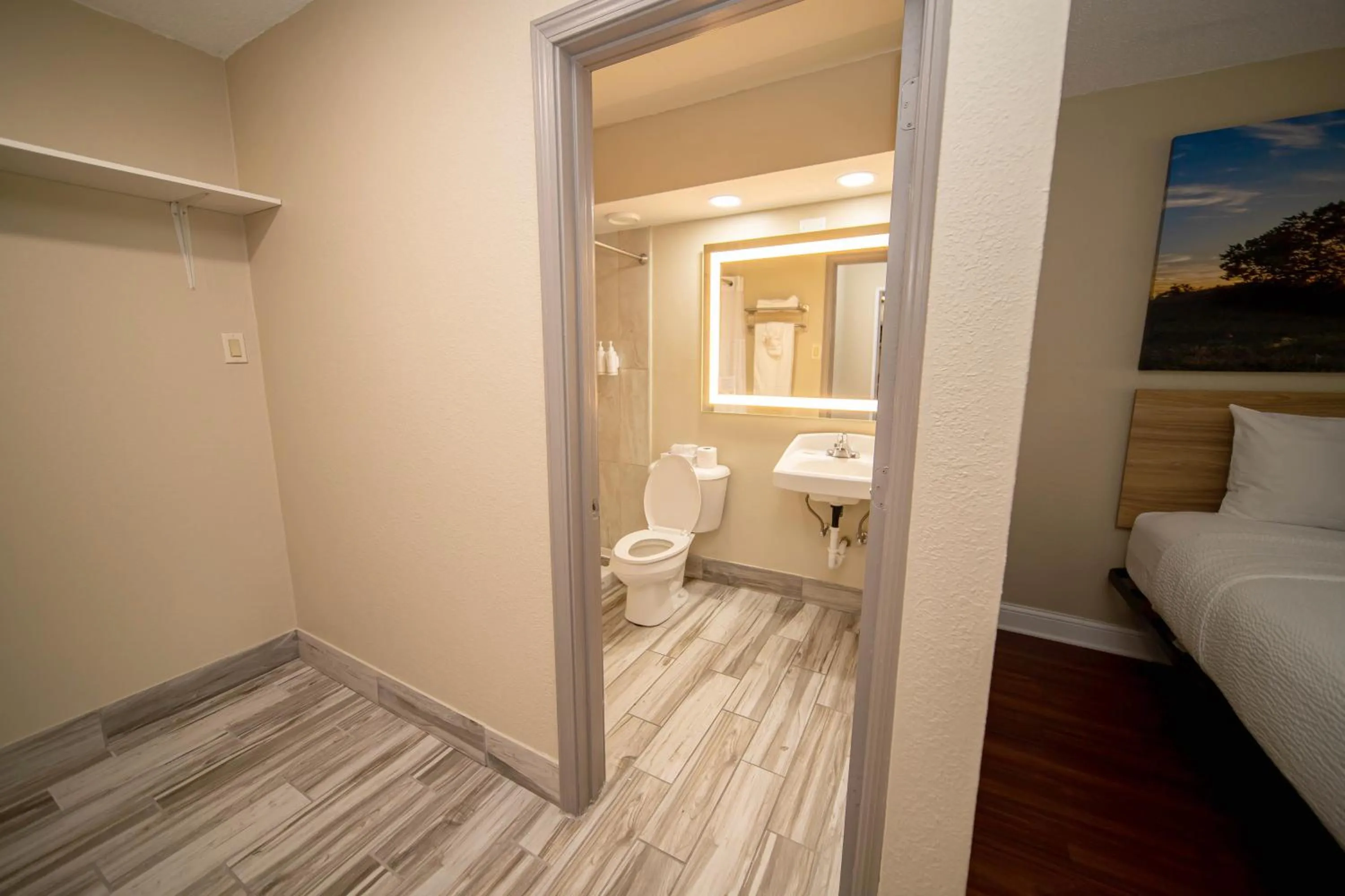 Bathroom, Bed in Days Inn and Suites by Wyndham Hammond, IN