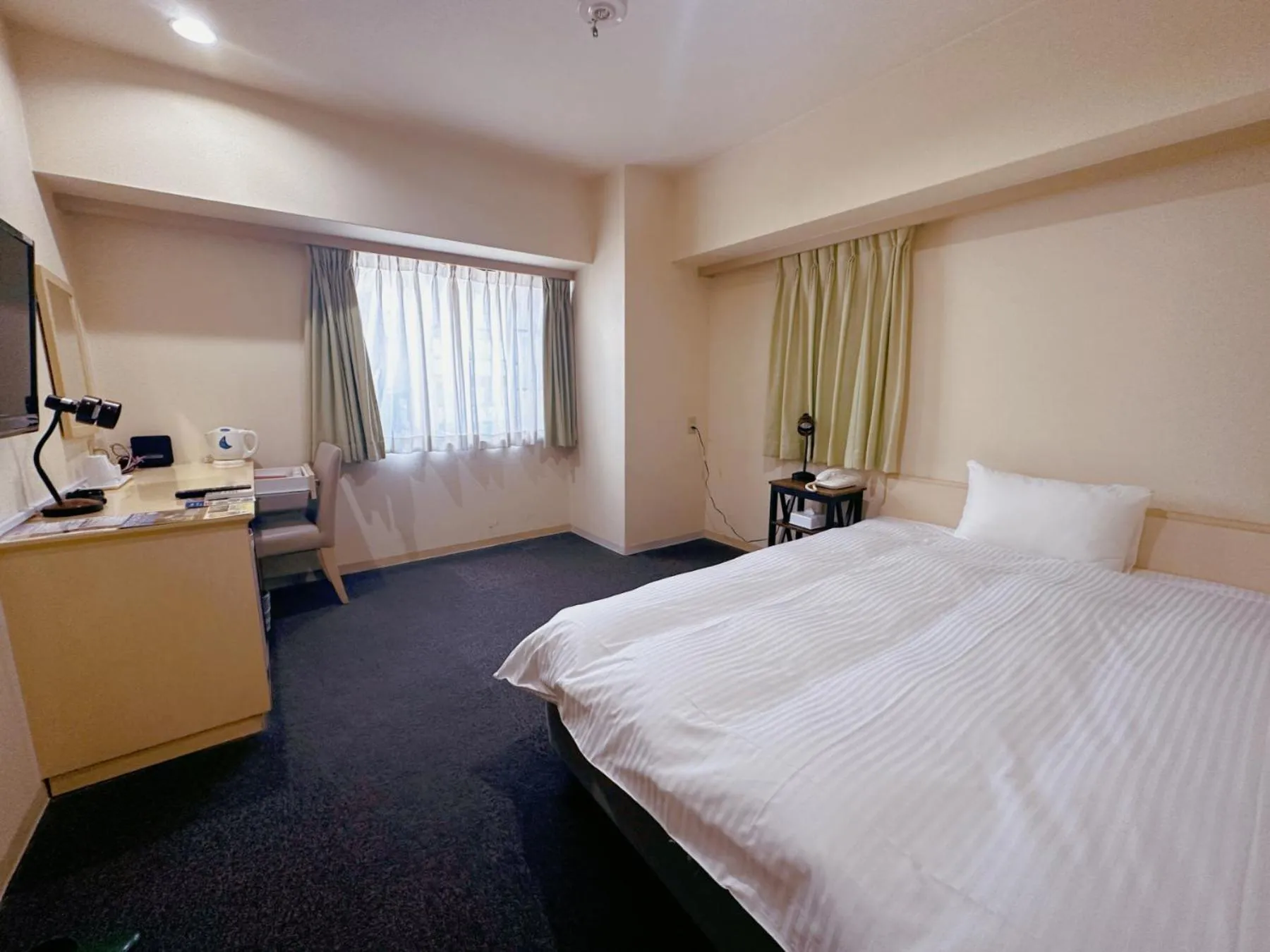 Photo of the whole room, Bed in Nissei Hotel Fukuoka