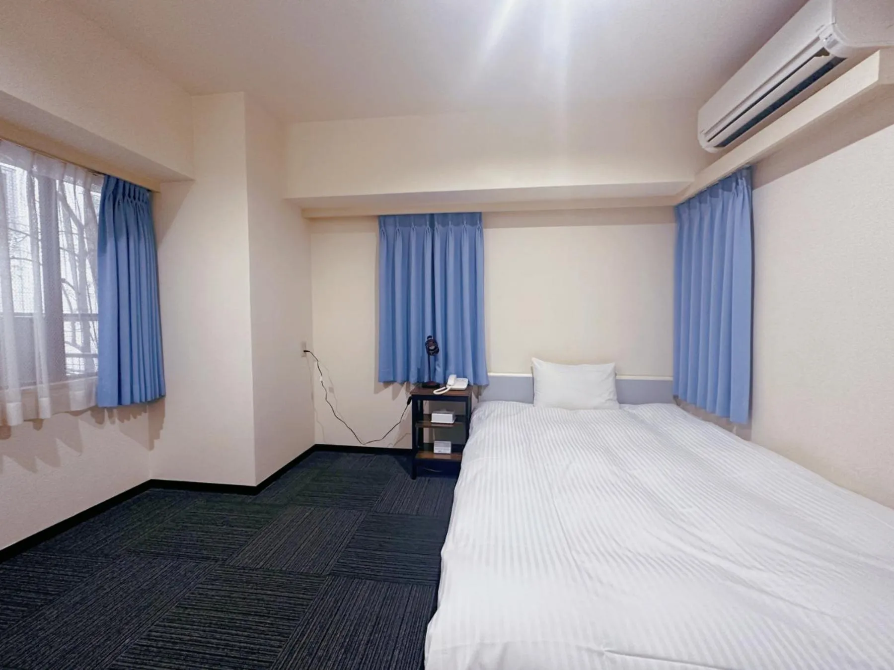 Photo of the whole room, Bed in Nissei Hotel Fukuoka