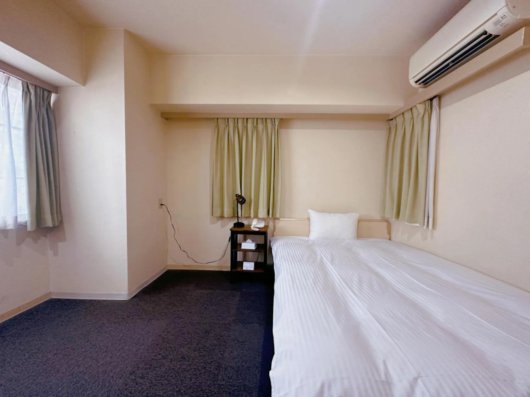 Photo of the whole room, Bed in Nissei Hotel Fukuoka