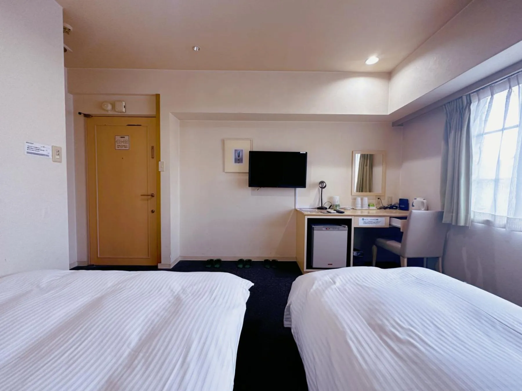 Photo of the whole room, Bed in Nissei Hotel Fukuoka