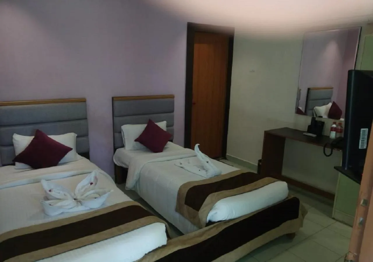 Bed in Mermaid Resorts & Banquets