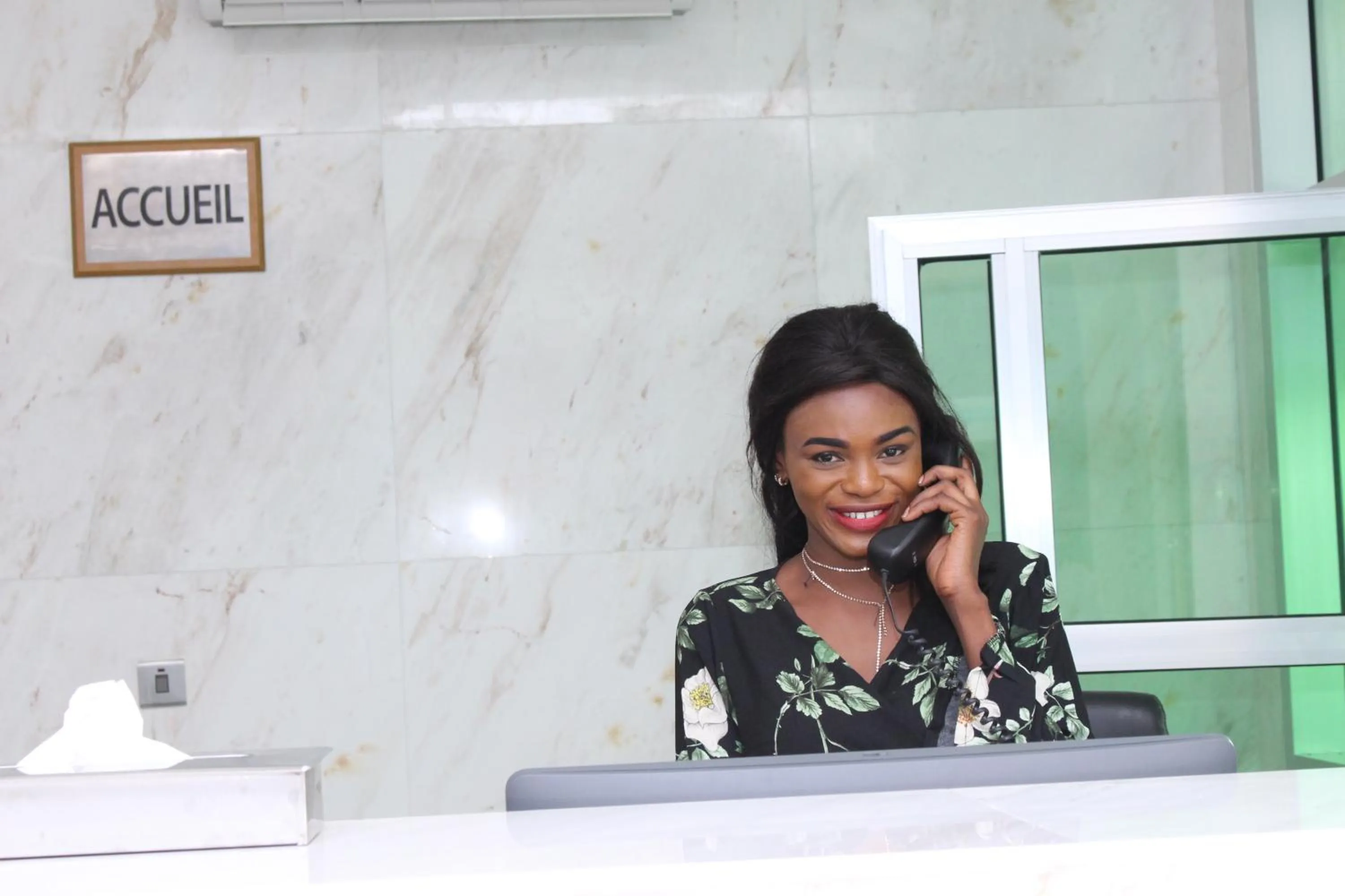 Lobby or reception in Paradisia Hotel