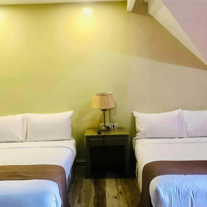 Bed in Skyland Garden Hotel and Resort