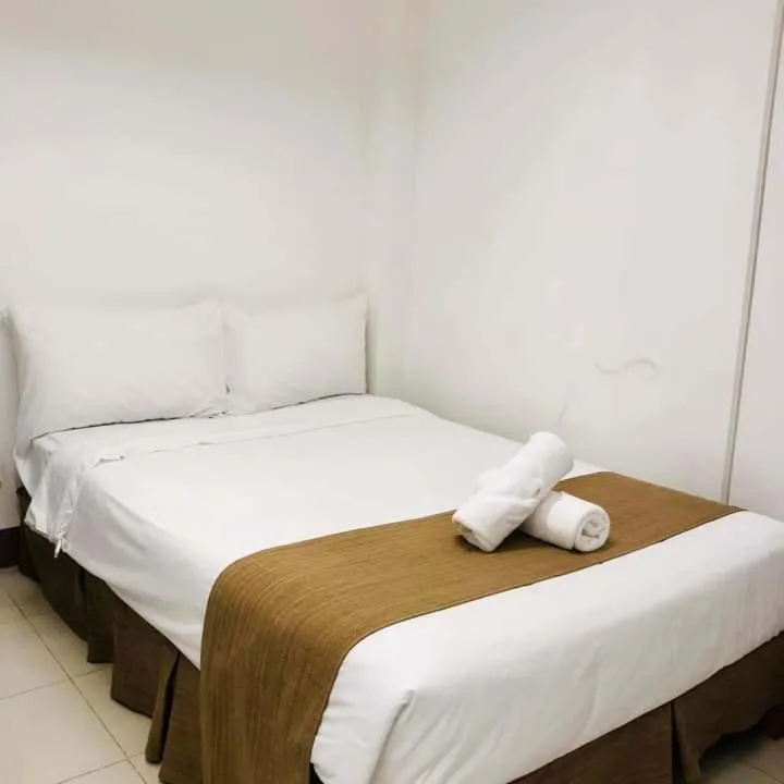 Bed in Skyland Garden Hotel and Resort