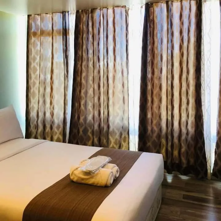 Bed in Skyland Garden Hotel and Resort