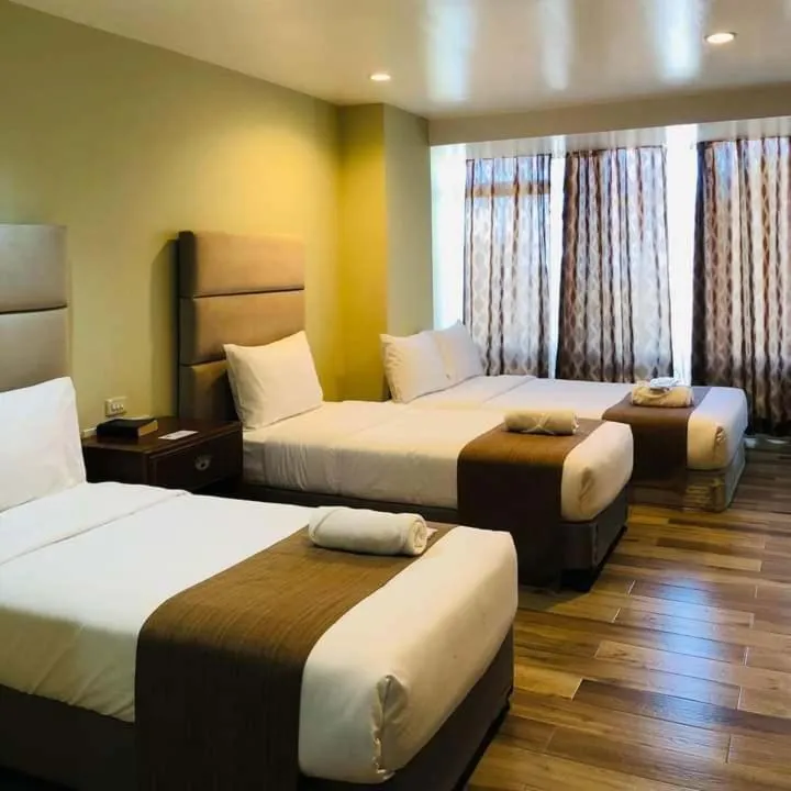 Bed in Skyland Garden Hotel and Resort