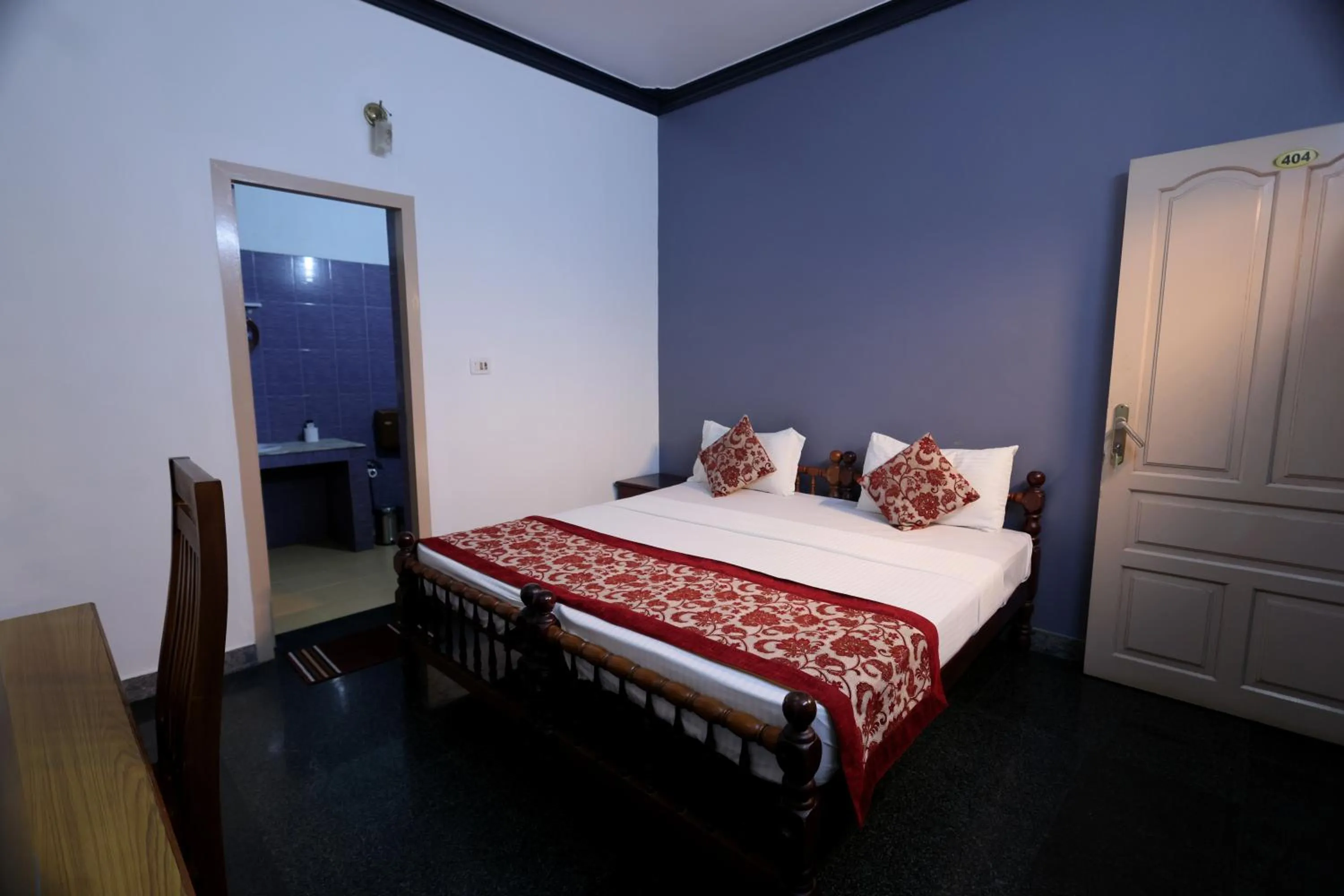 Bed in Ideal Ayurvedic Resort Kovalam