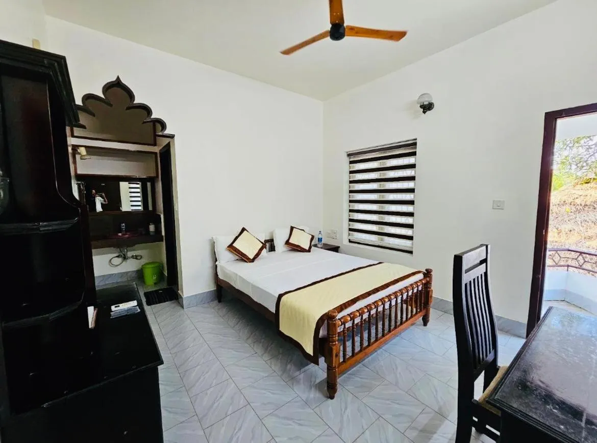 Bed in Ideal Ayurvedic Resort Kovalam