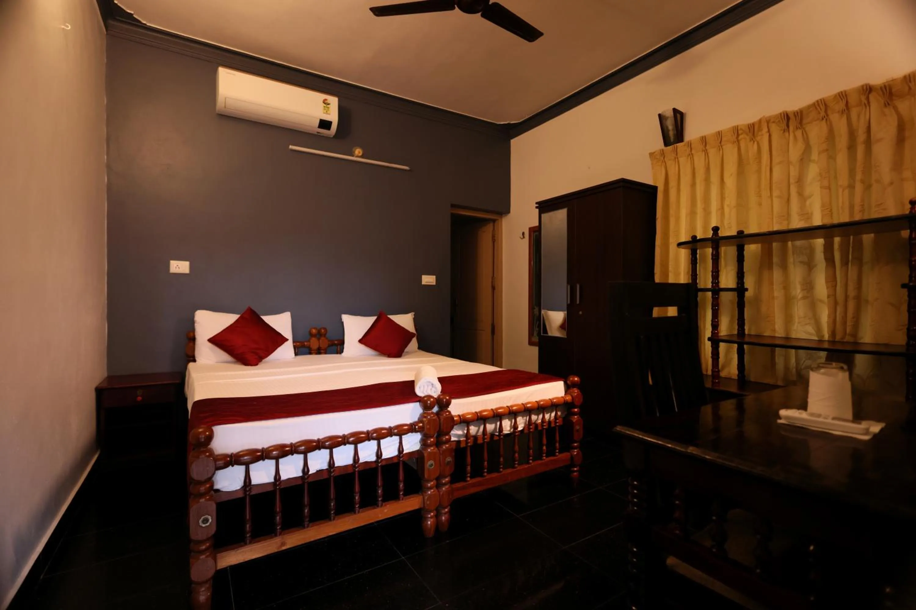 Bed in Ideal Ayurvedic Resort Kovalam