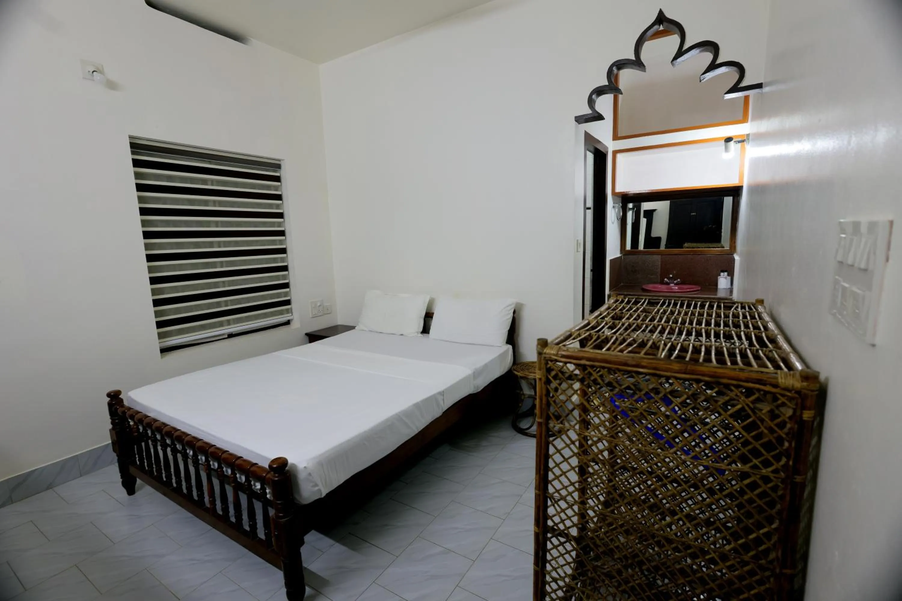 Bed in Ideal Ayurvedic Resort Kovalam