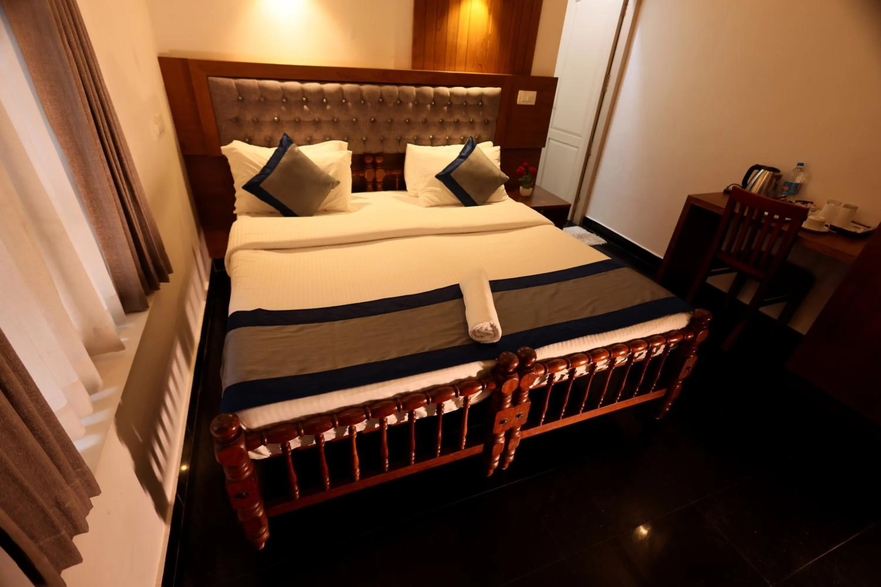 Bed in Ideal Ayurvedic Resort Kovalam