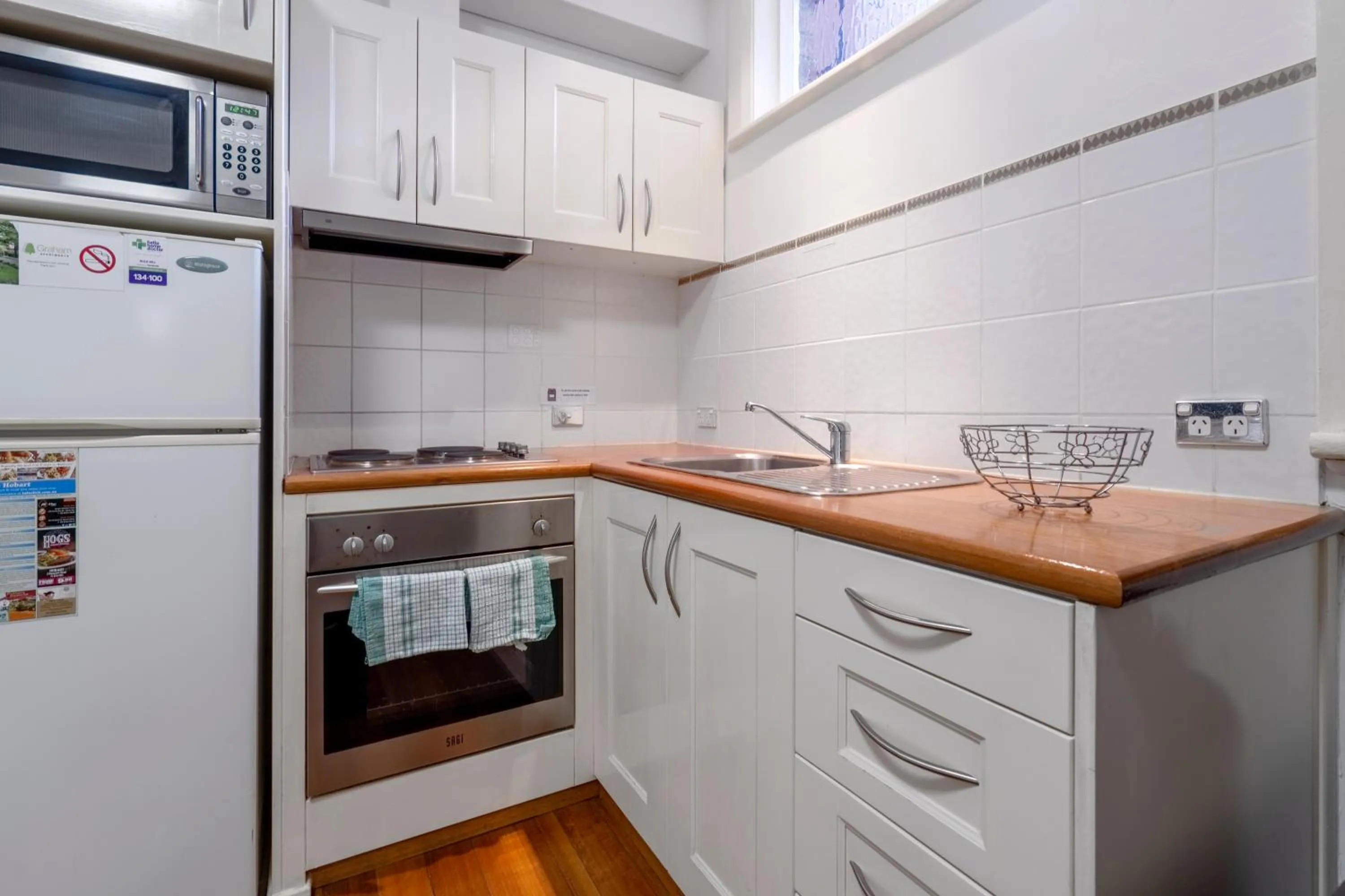 Kitchen or kitchenette in Graham Apartments