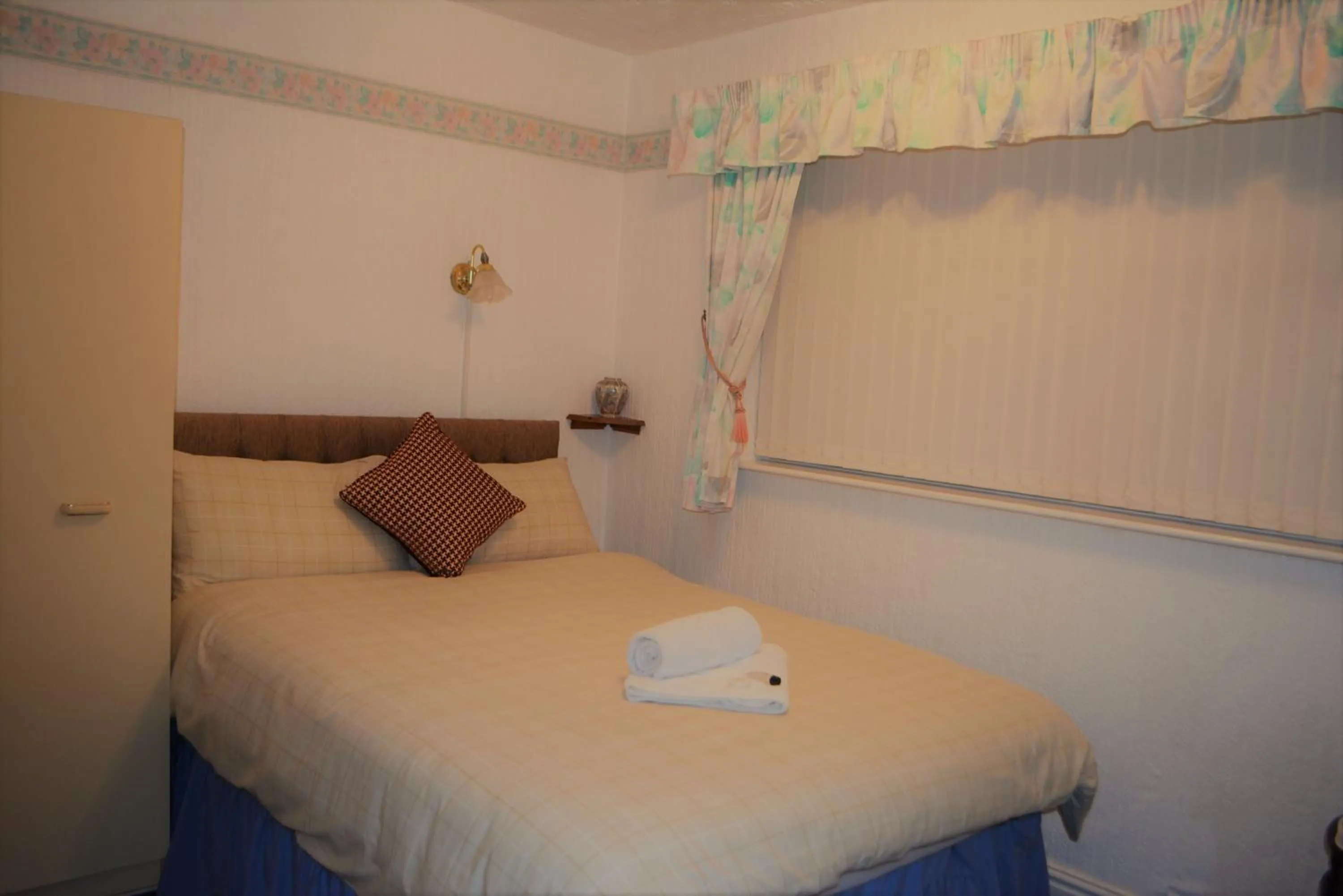 Bed in The Woodland Hotel