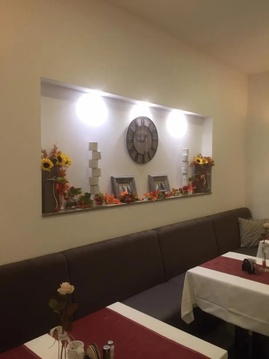 Seating area in Pension & Restaurant La Amalia