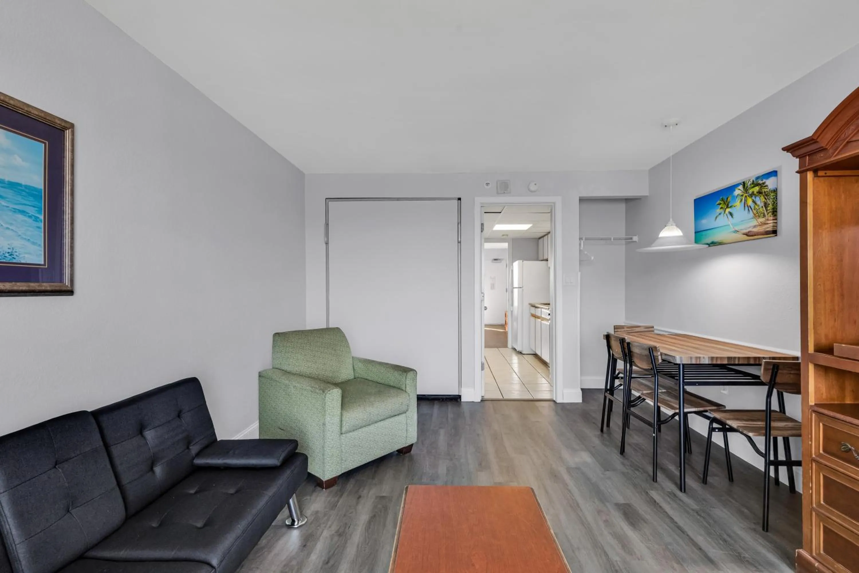 Living room in Boardwalk Beach Resort Condo w Oceanfront Balcony