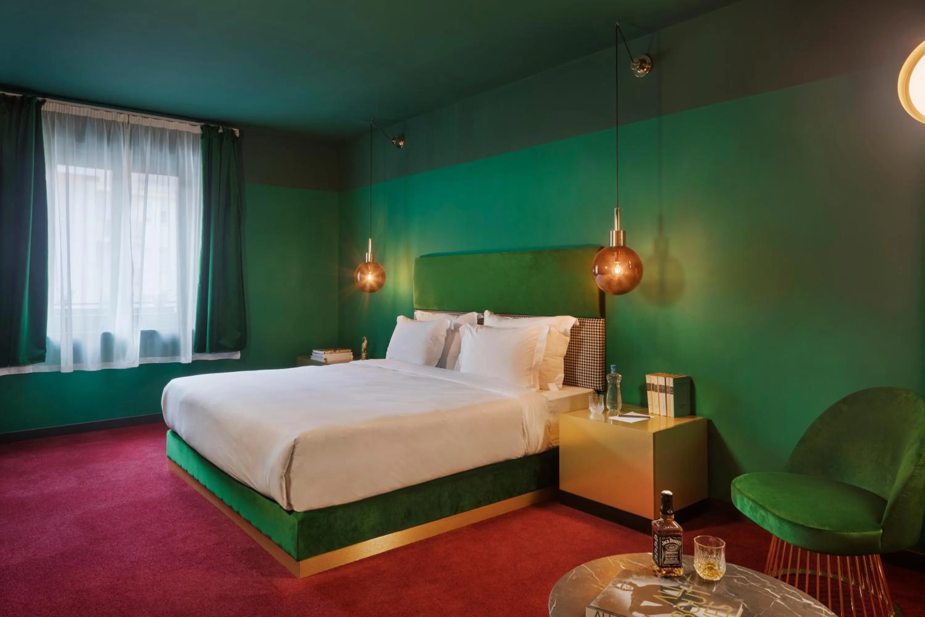 Seating area, Bed in Stories Boutique Hotel