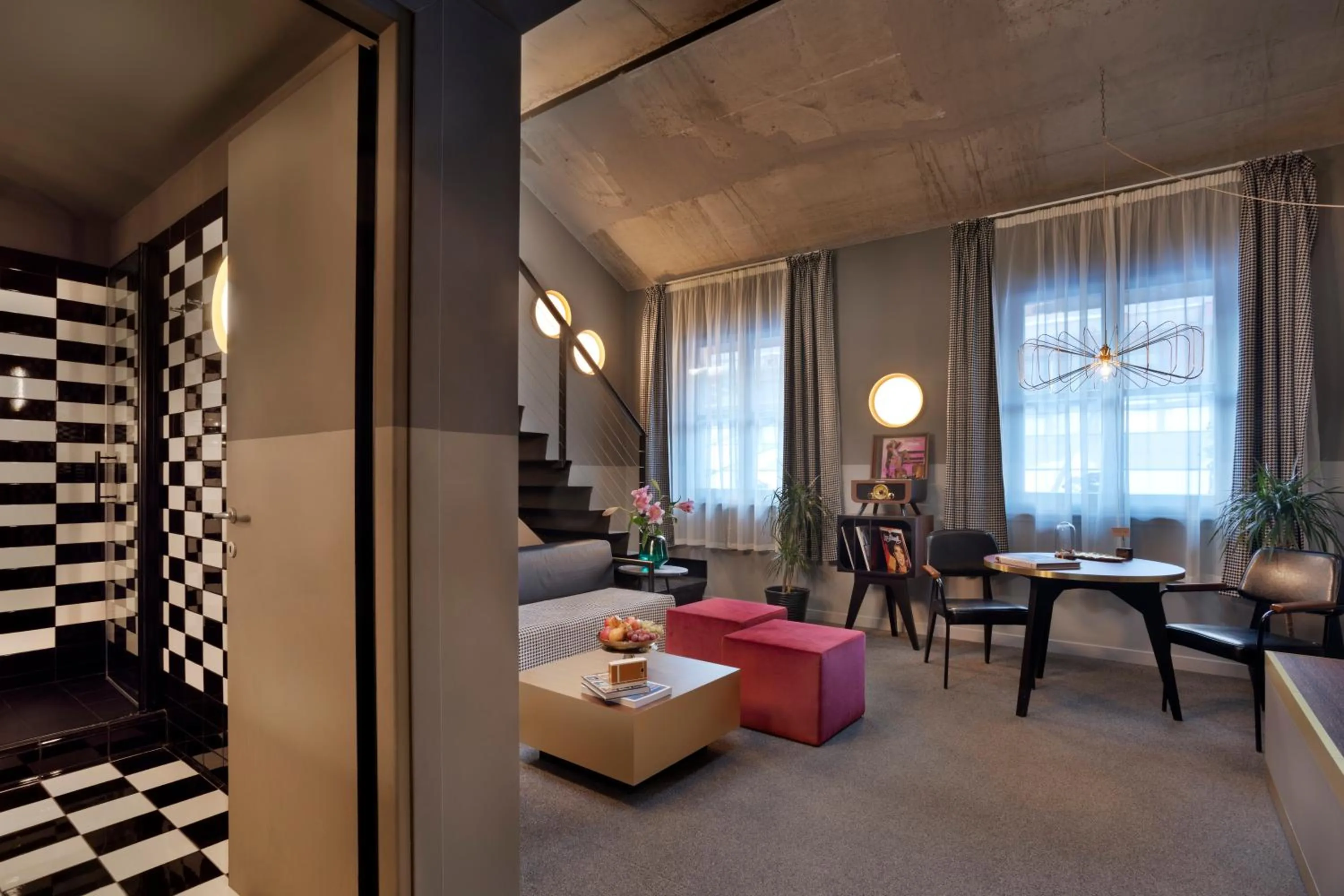 Living room, Bed in Stories Boutique Hotel