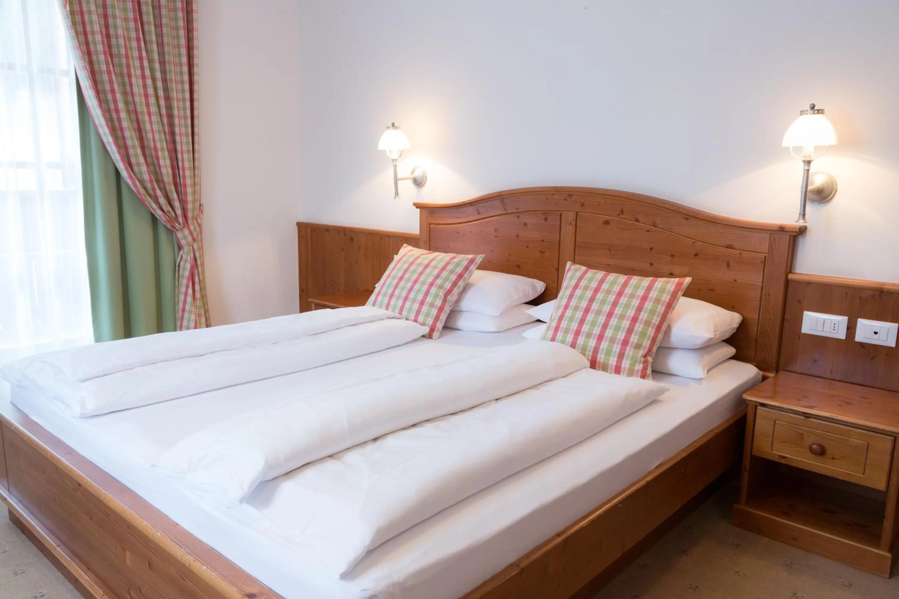 Bed in Boutique Hotel Olympia