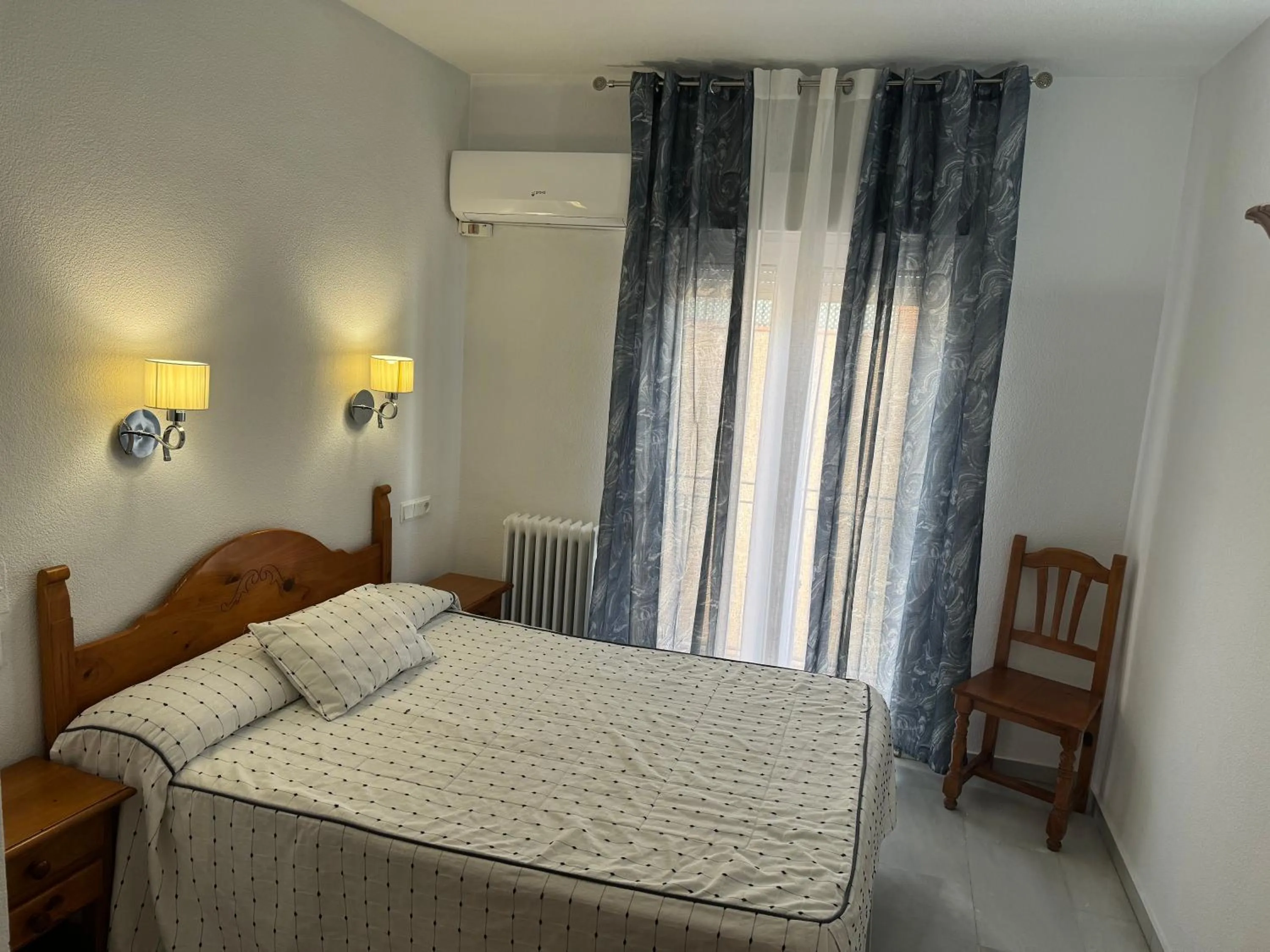 Bed in Hotel Mirasol