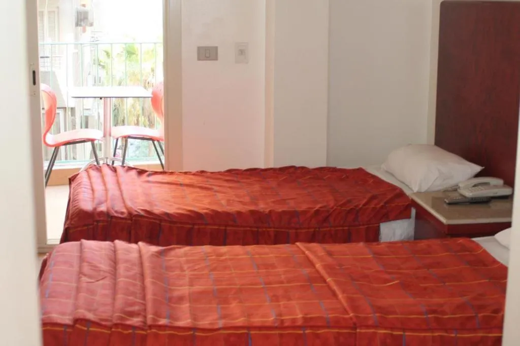 Bed in Pharaohs Hotel