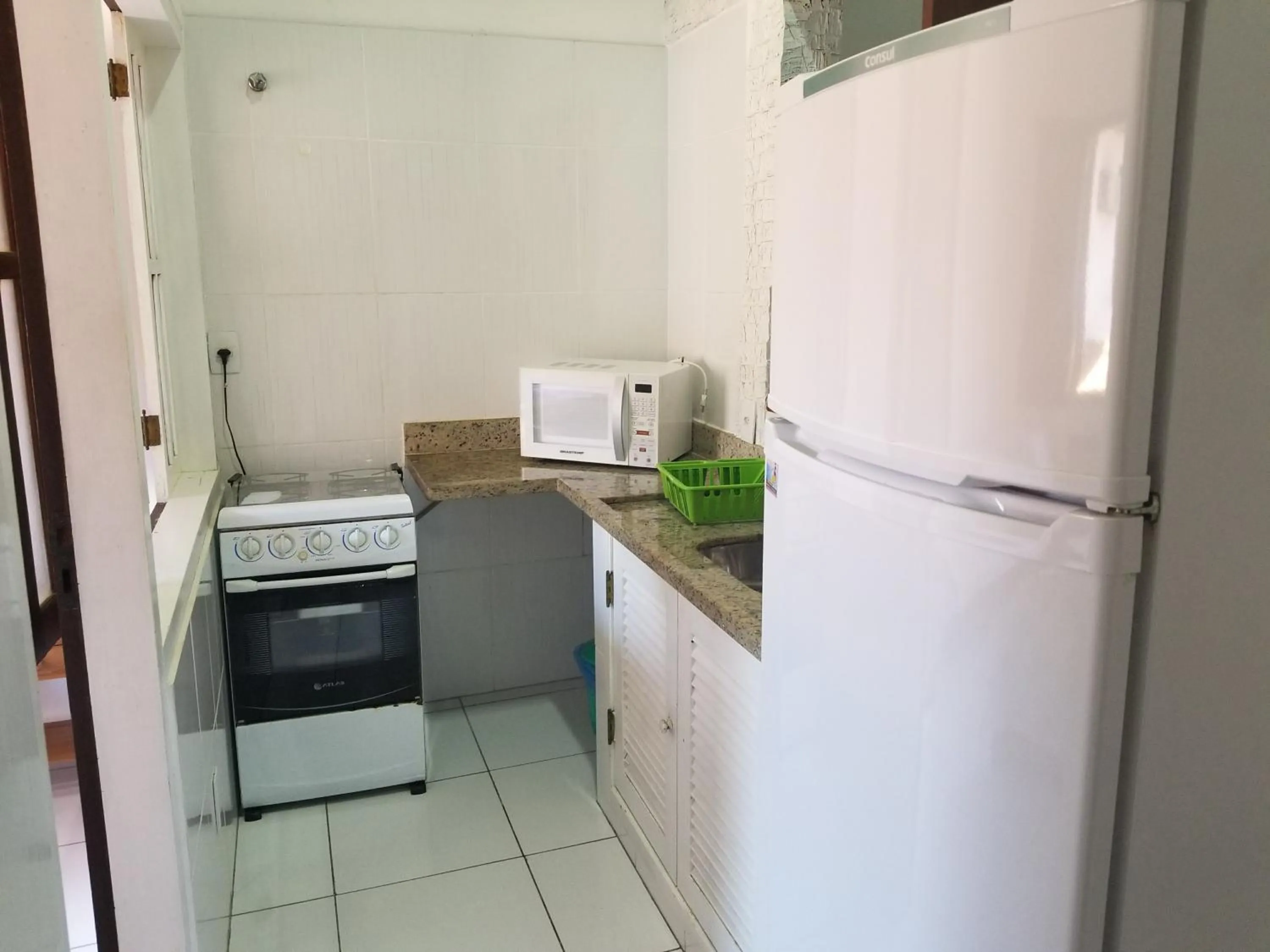 Kitchen or kitchenette in Flat - Geribá Apart Hotel