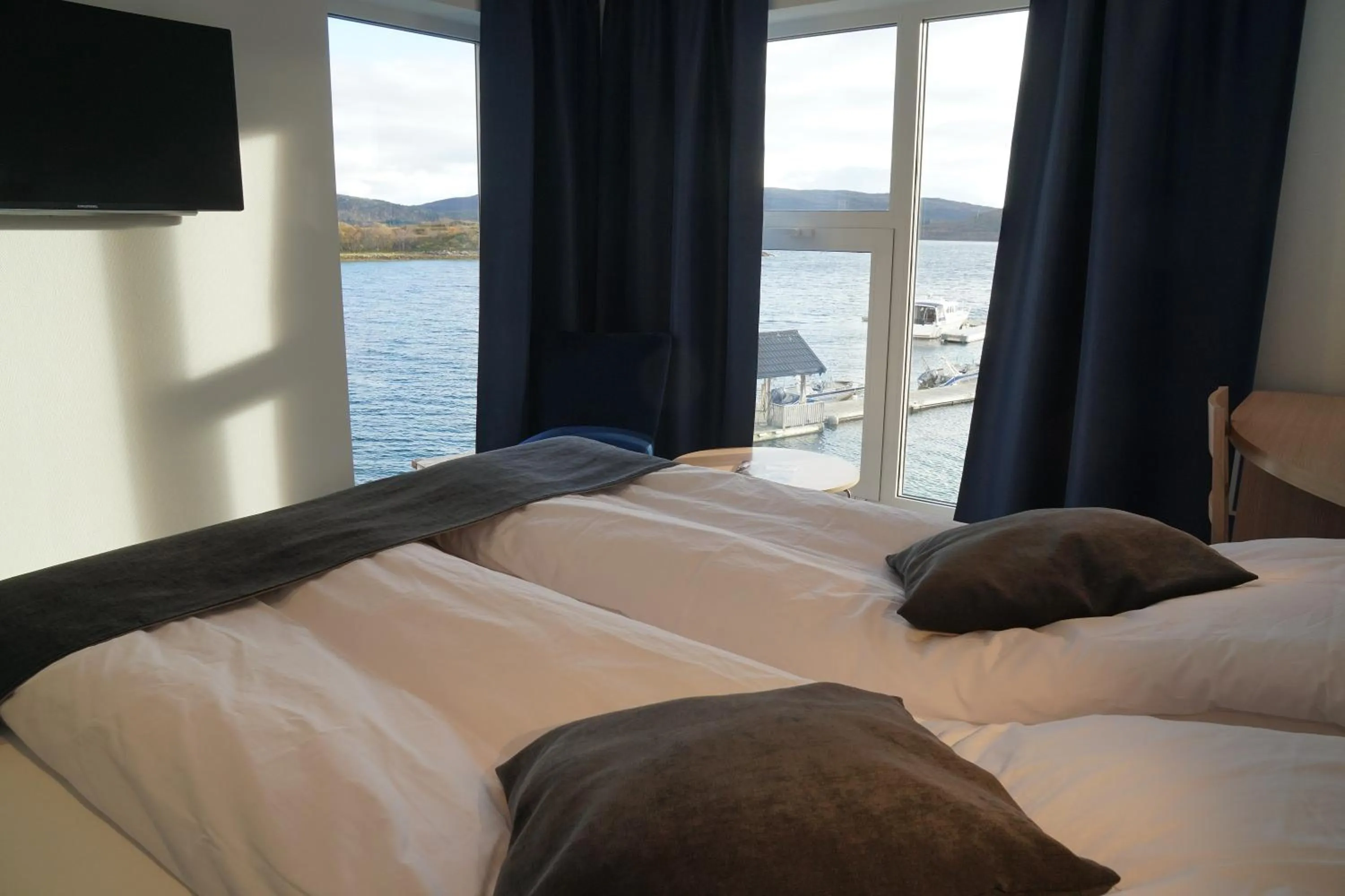 Bed in Senja Fjordhotell and Apartments