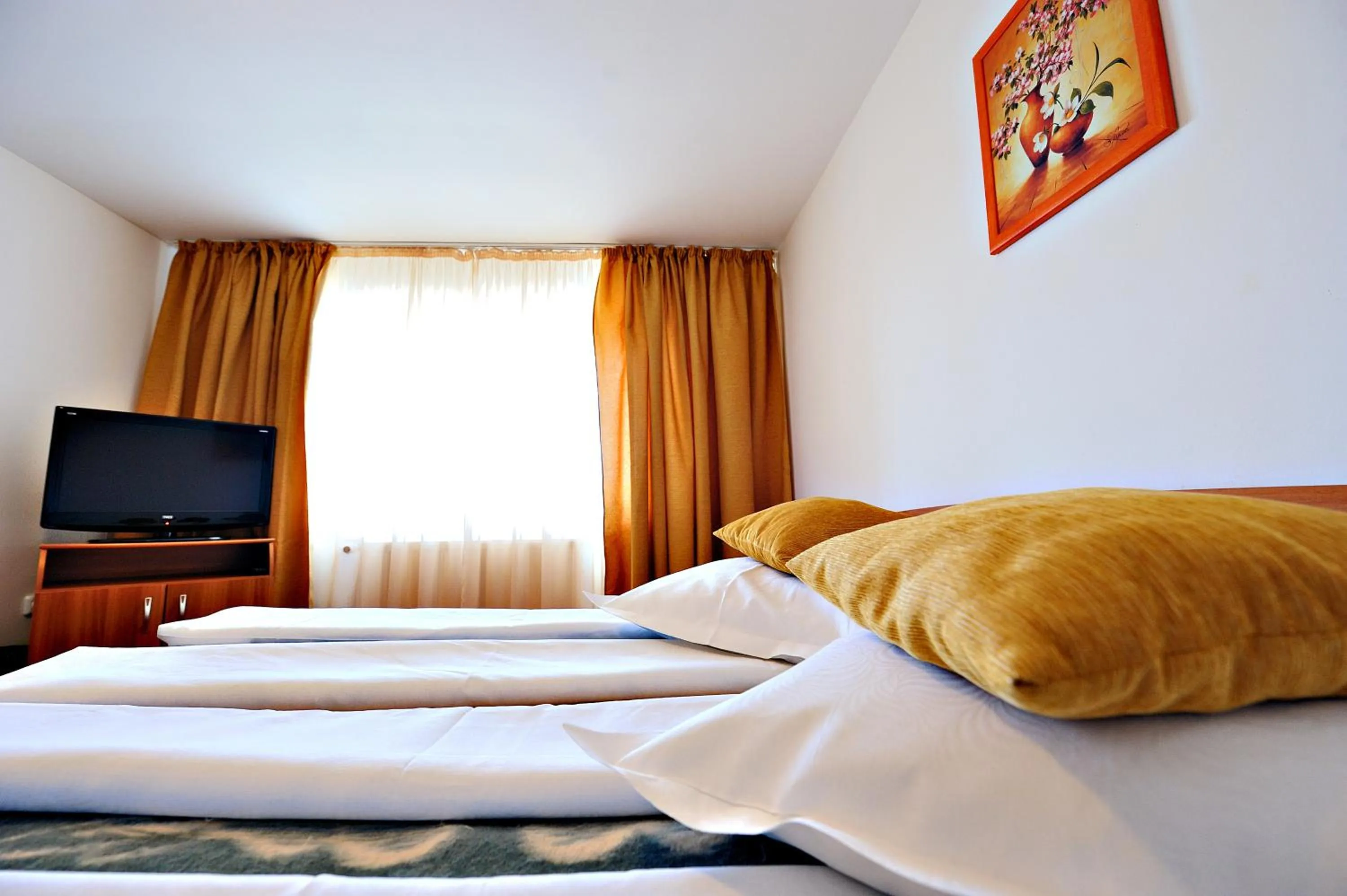 Bed in Motel Confort