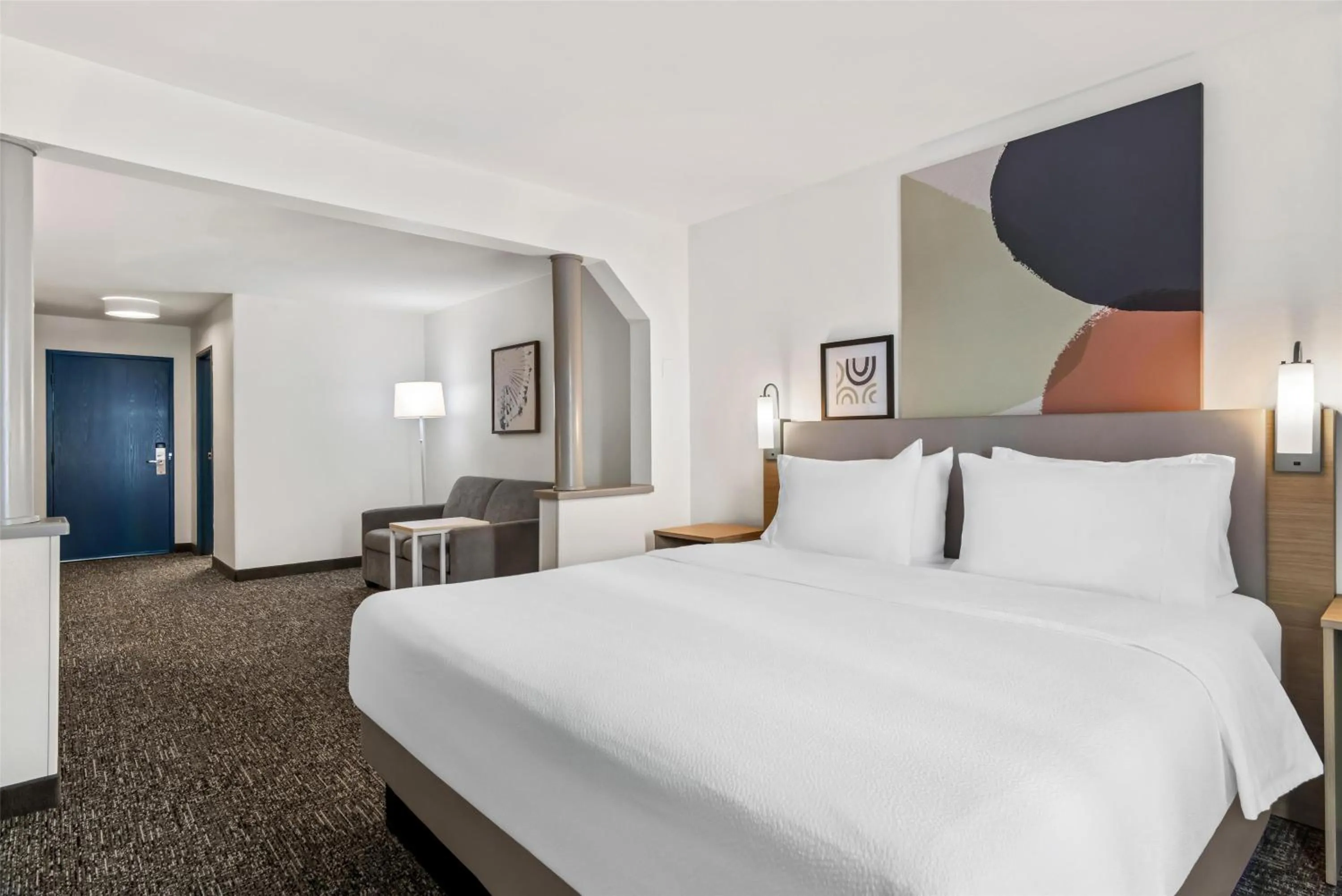 Living room, Bed in Spark By Hilton Merrillville