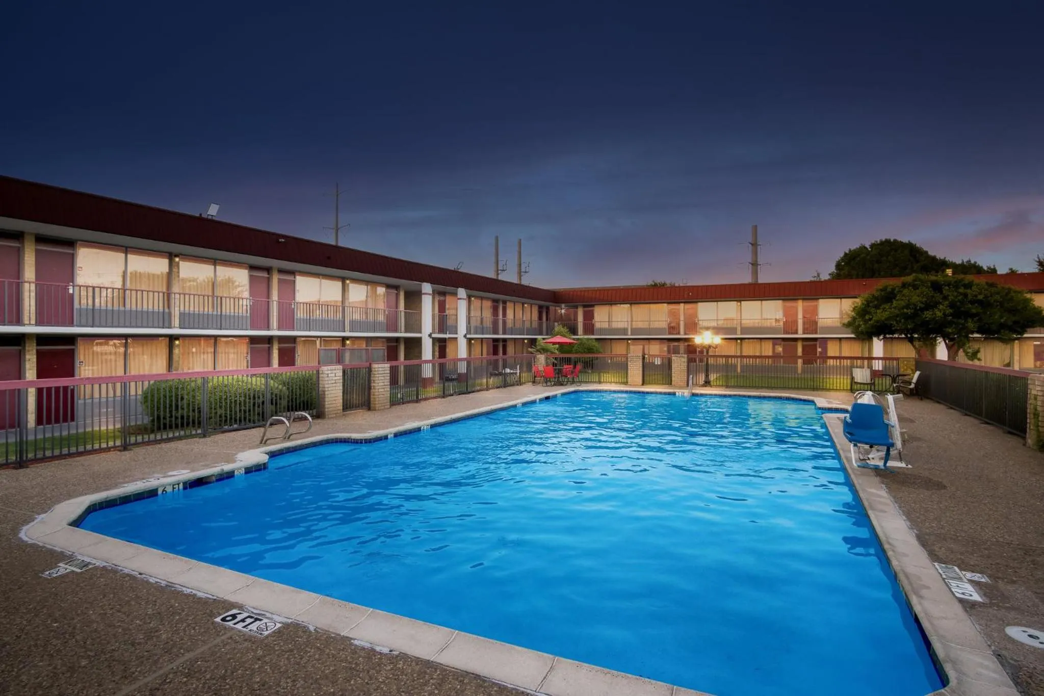 Swimming pool in Red Roof Inn & Conference Center McKinney