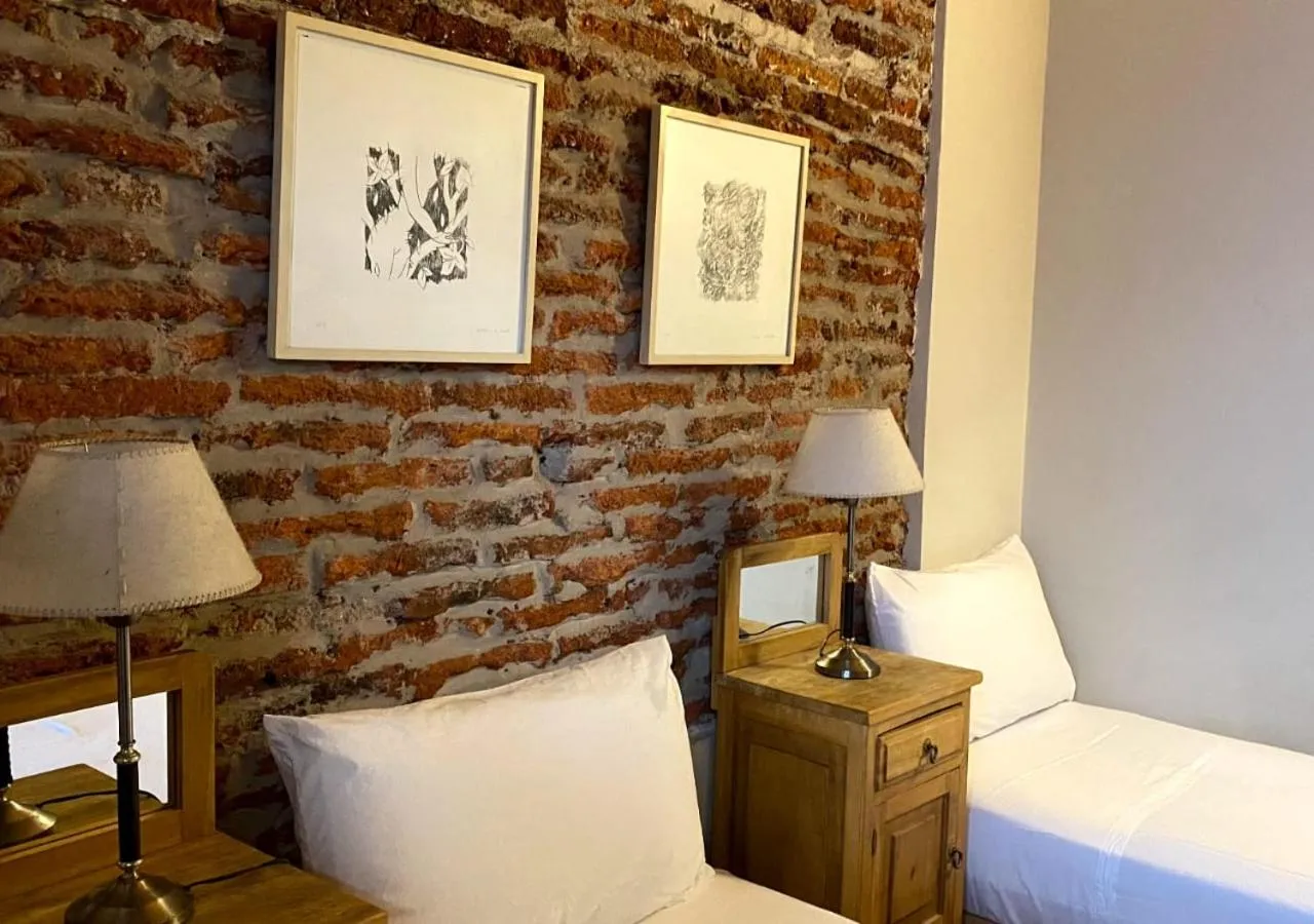 Photo of the whole room, Bed in Posada Gotan