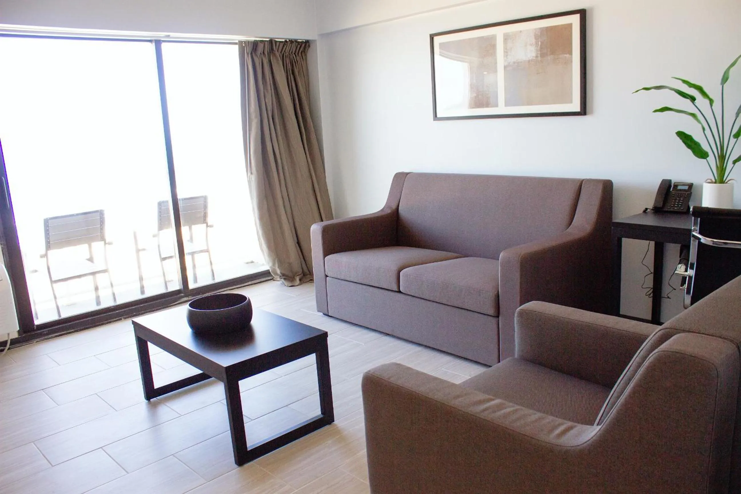 Living room in Sun & Sand Resort Oceanfront Suites