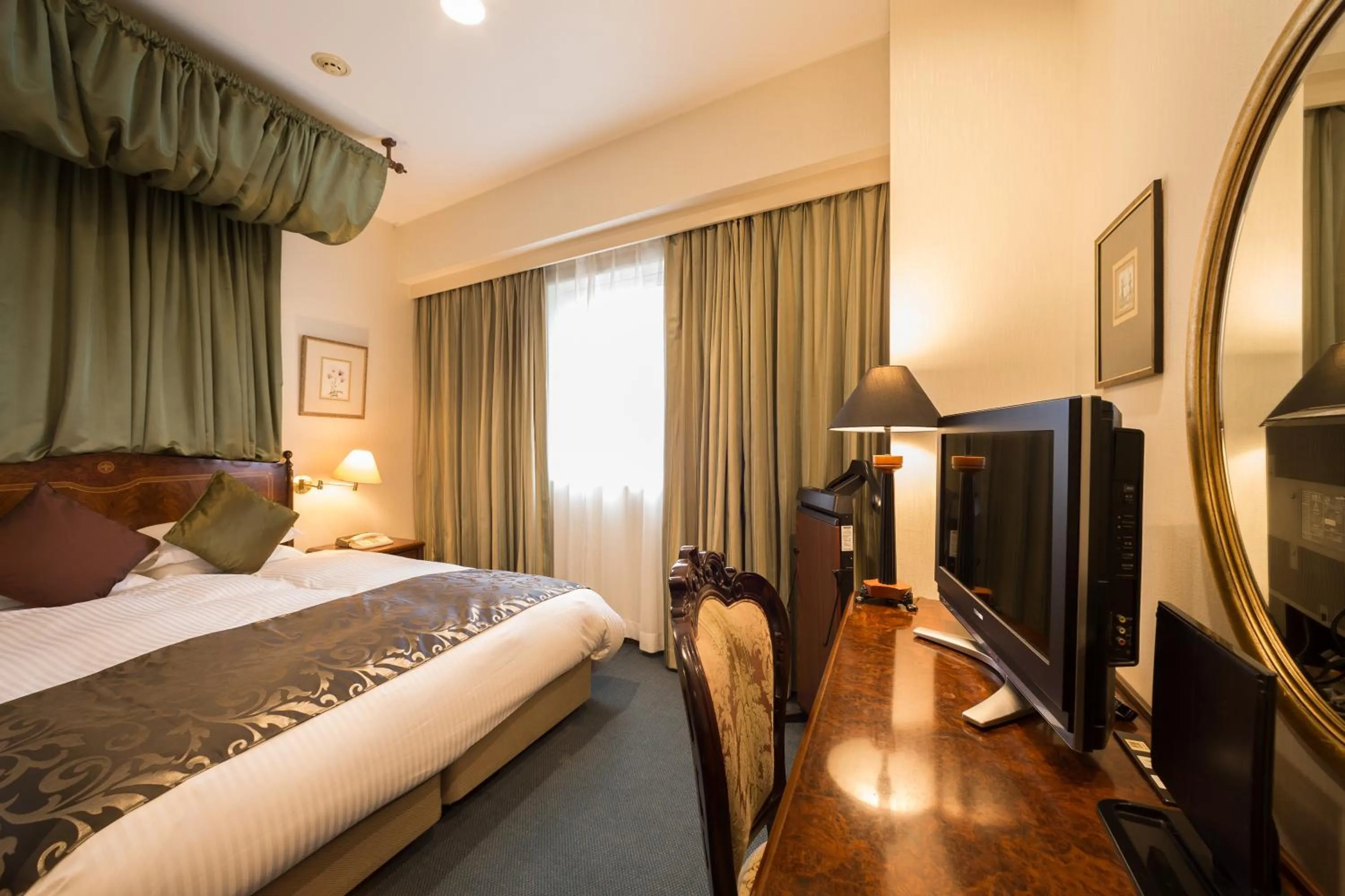 Bed in Dukes Hotel Nakasu