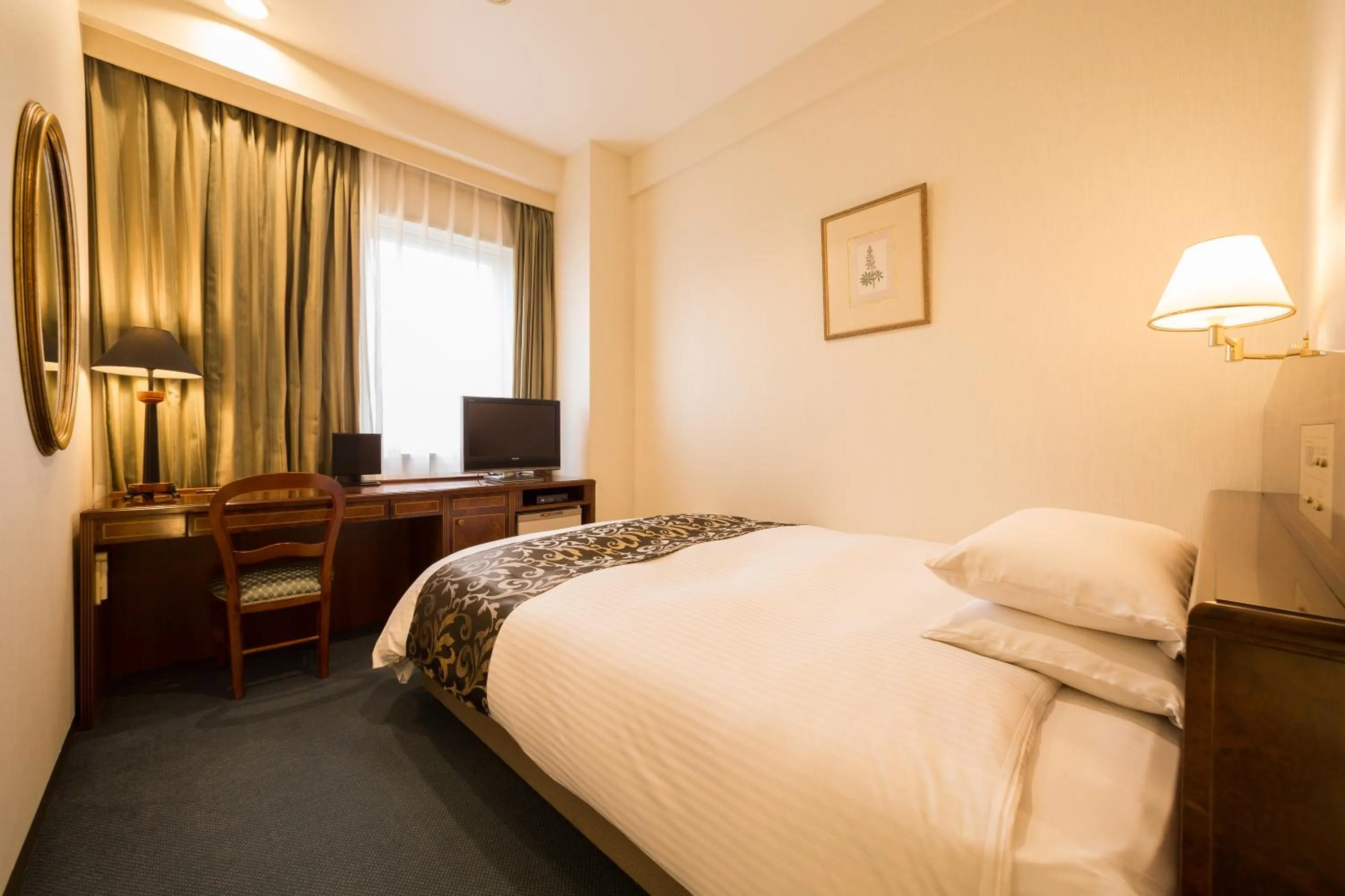 Bed in Dukes Hotel Nakasu