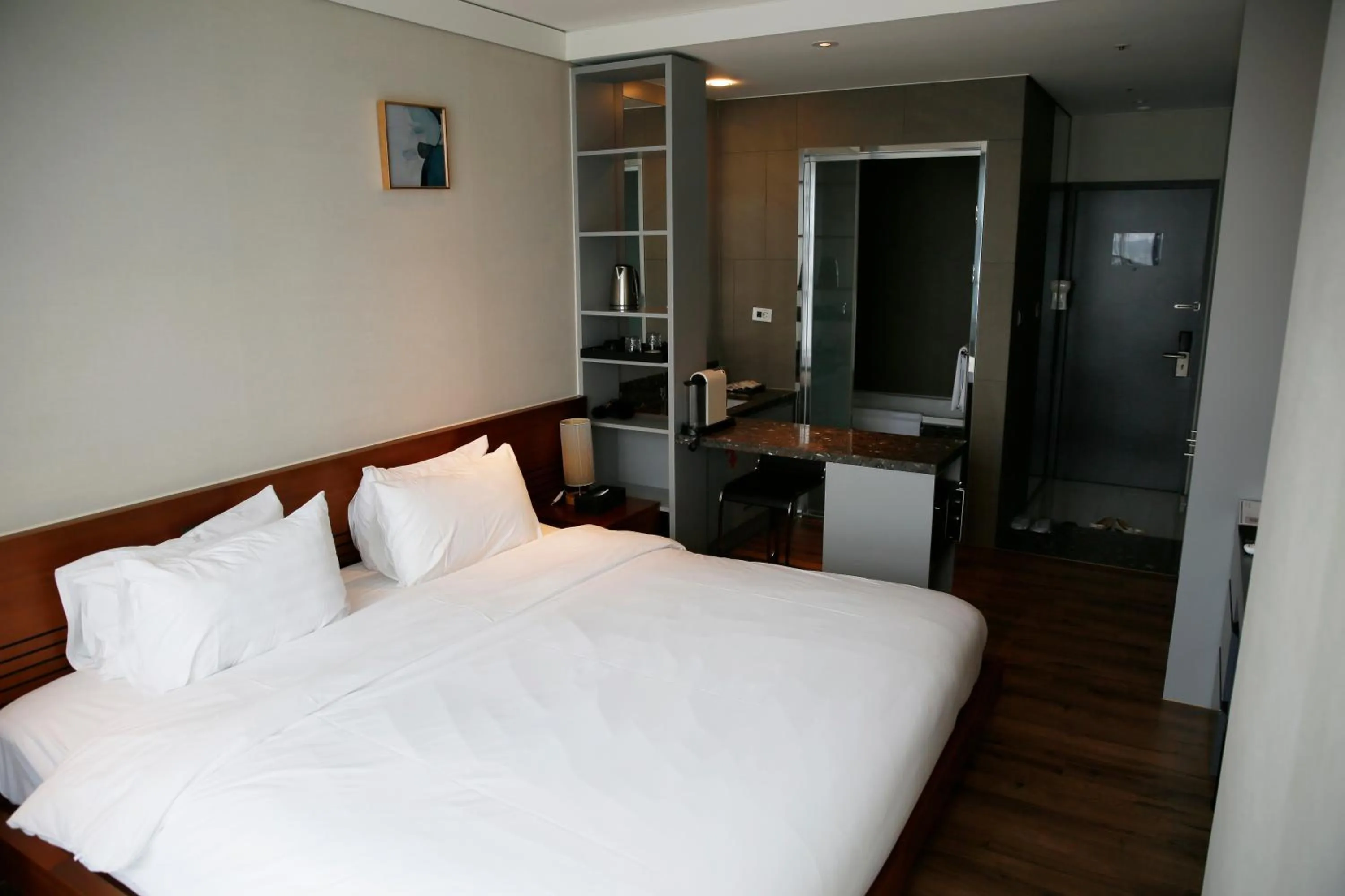 Bed in J One Hotel Cheongju