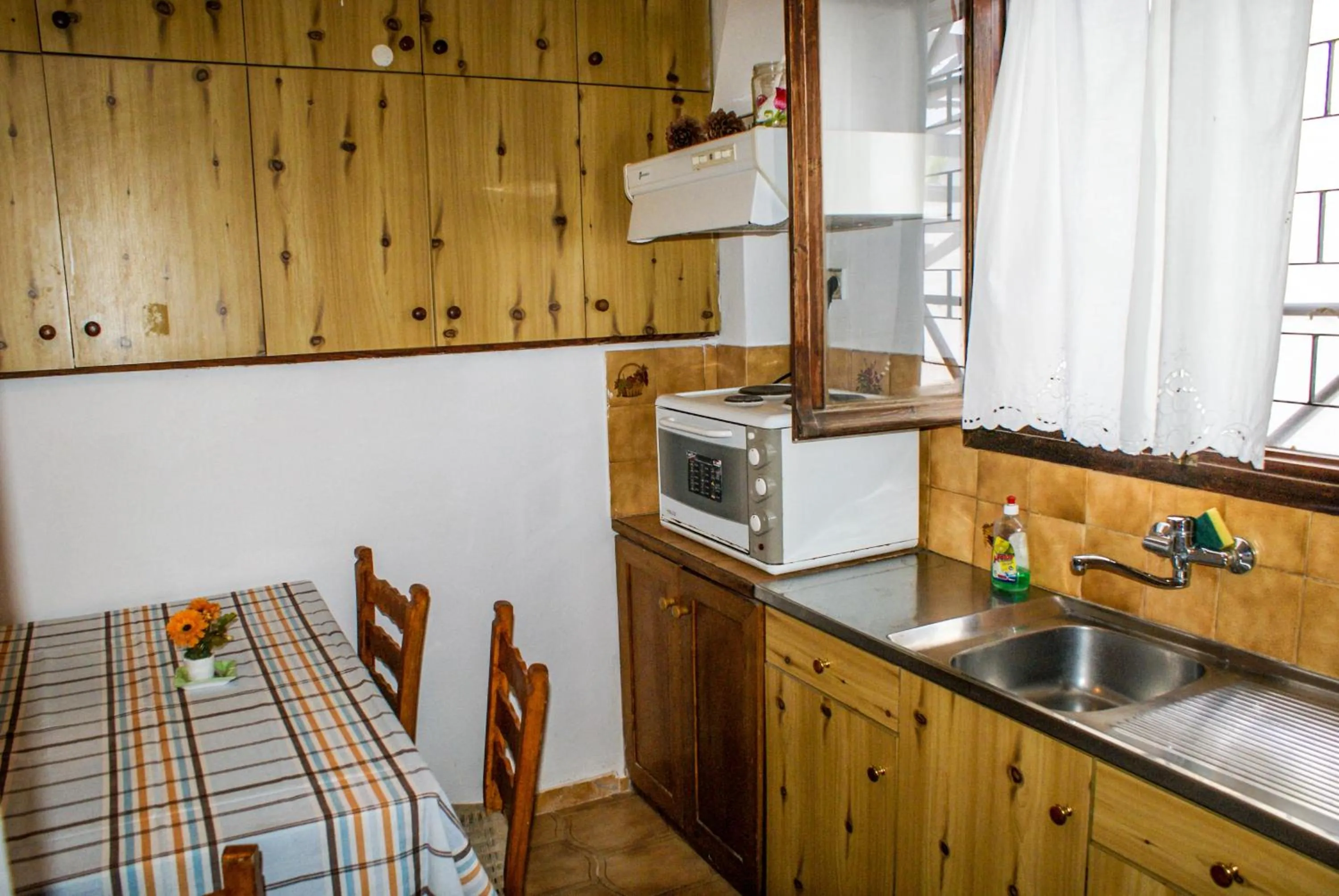 Kitchen or kitchenette in Amorani Studios