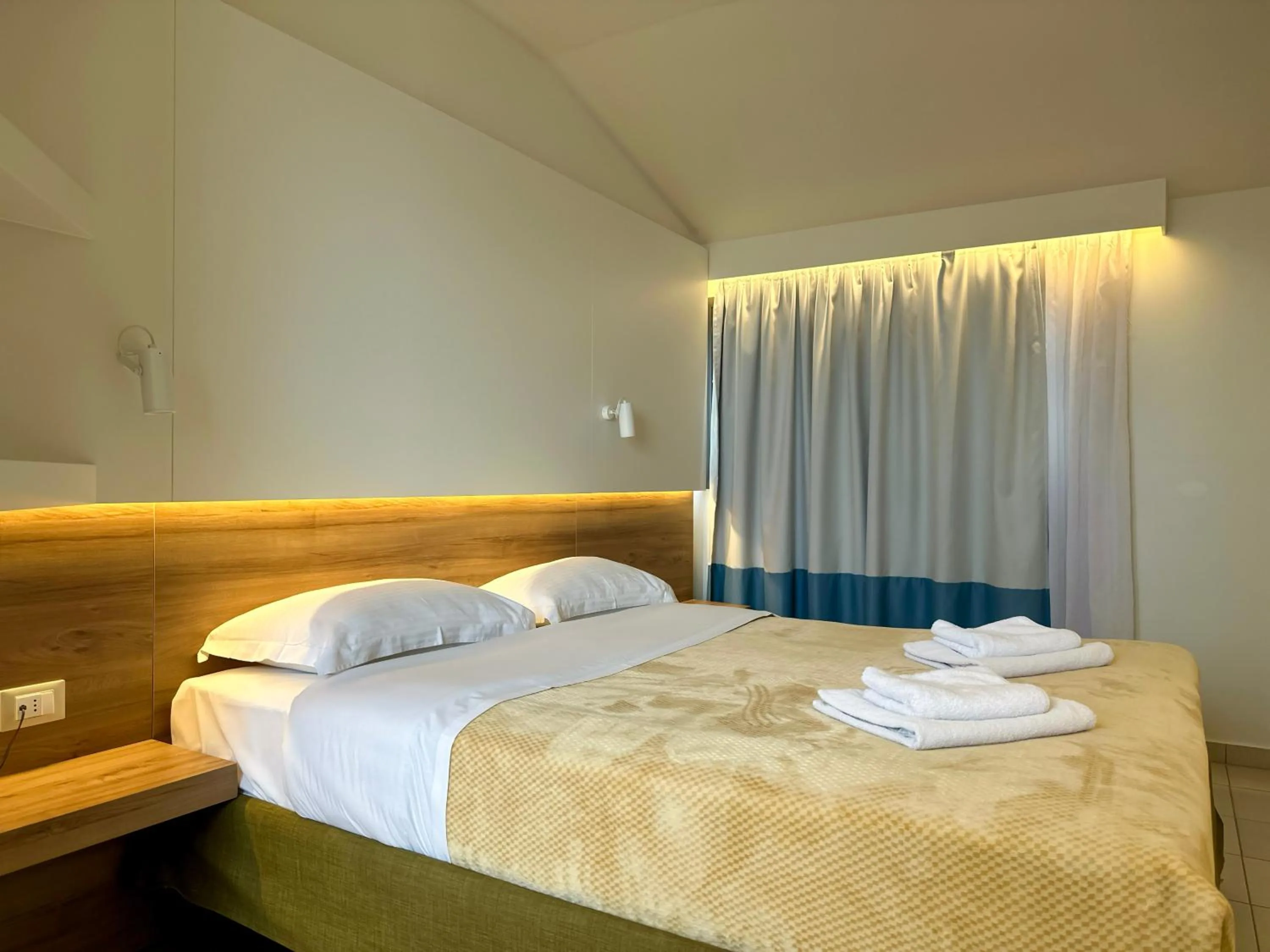 Bed in Hotel Mavridis