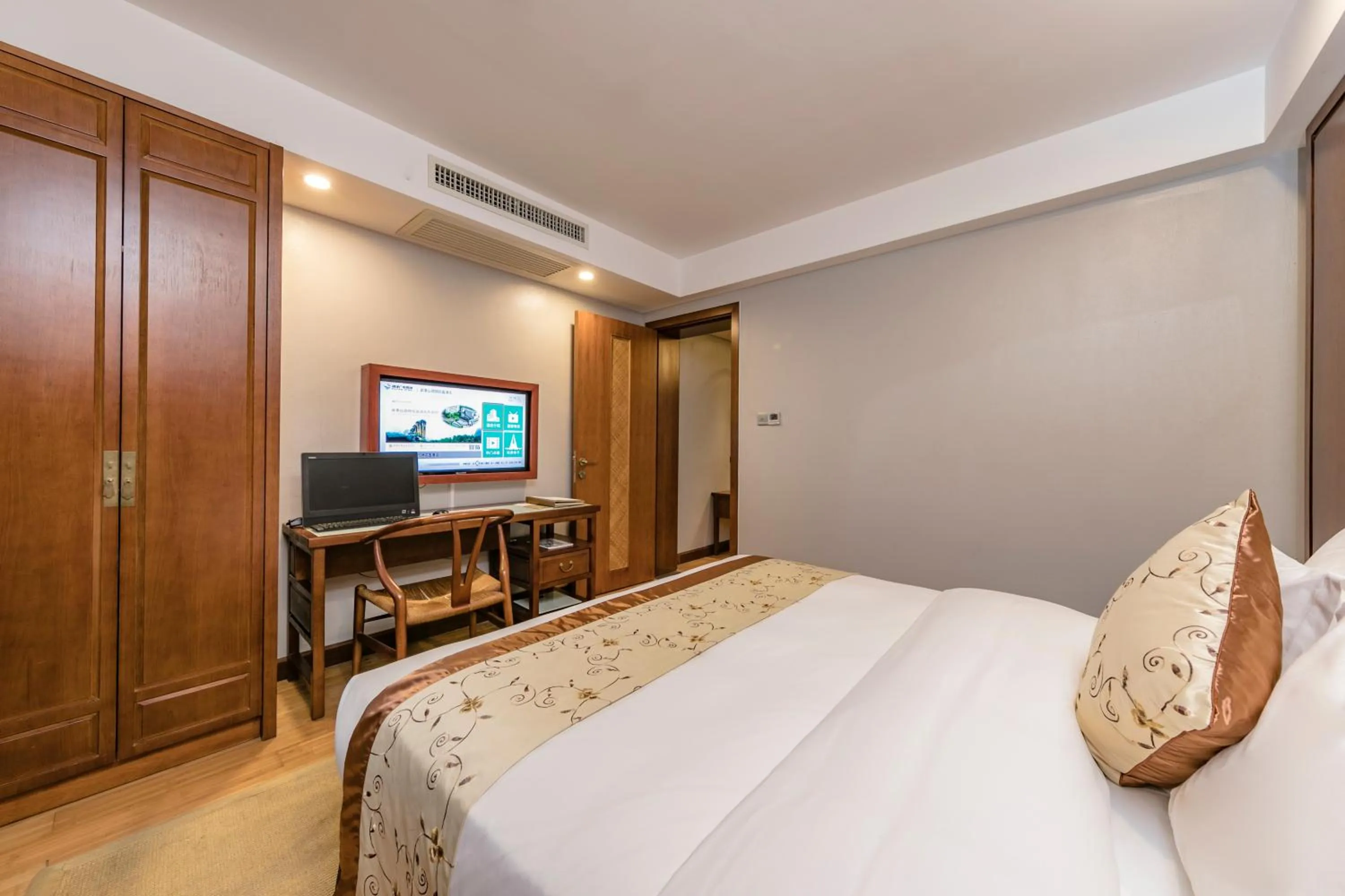 Bed in Fliport Garden Hotel Wuyishan