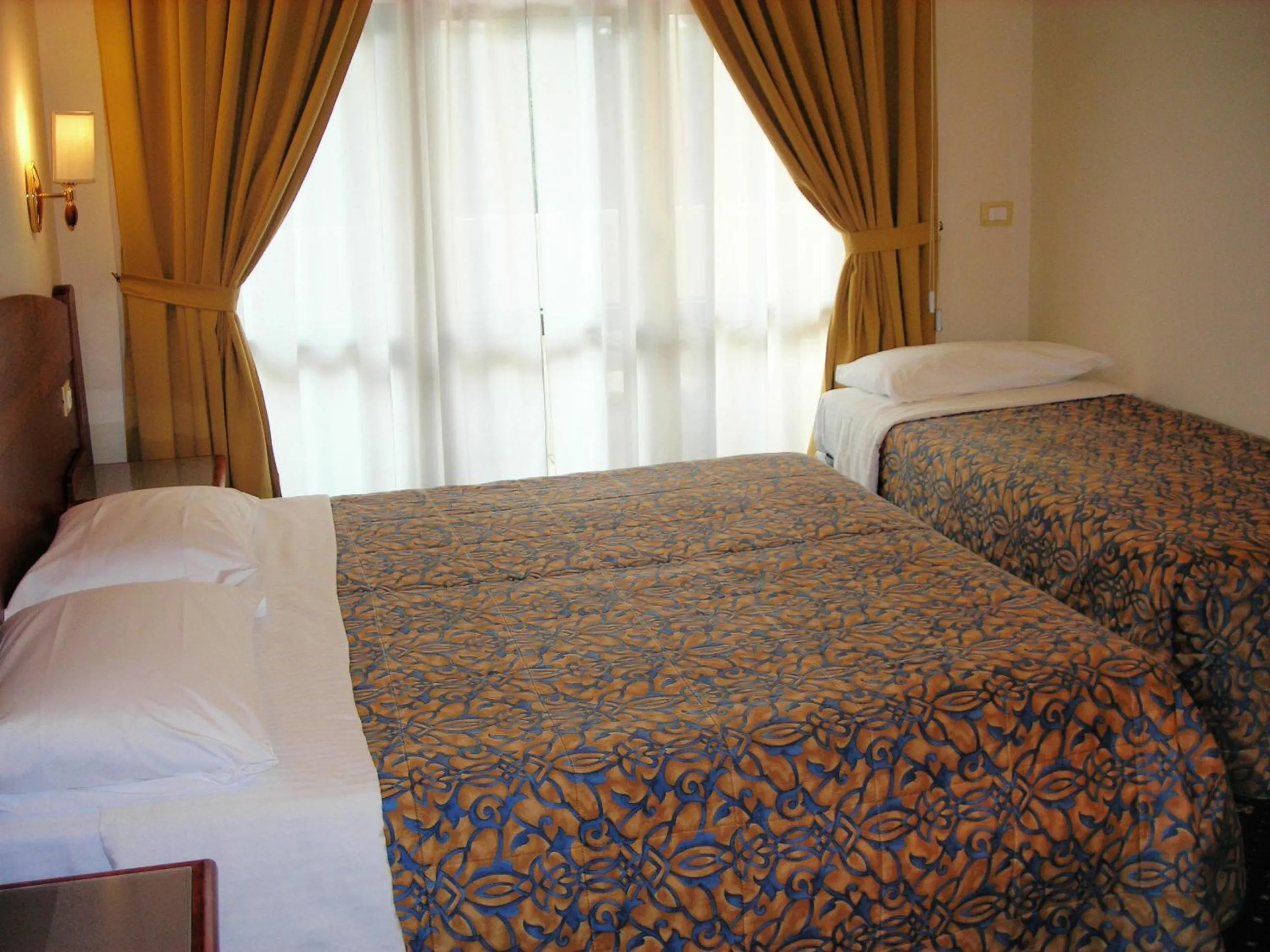 Bed in Hotel Smeraldo