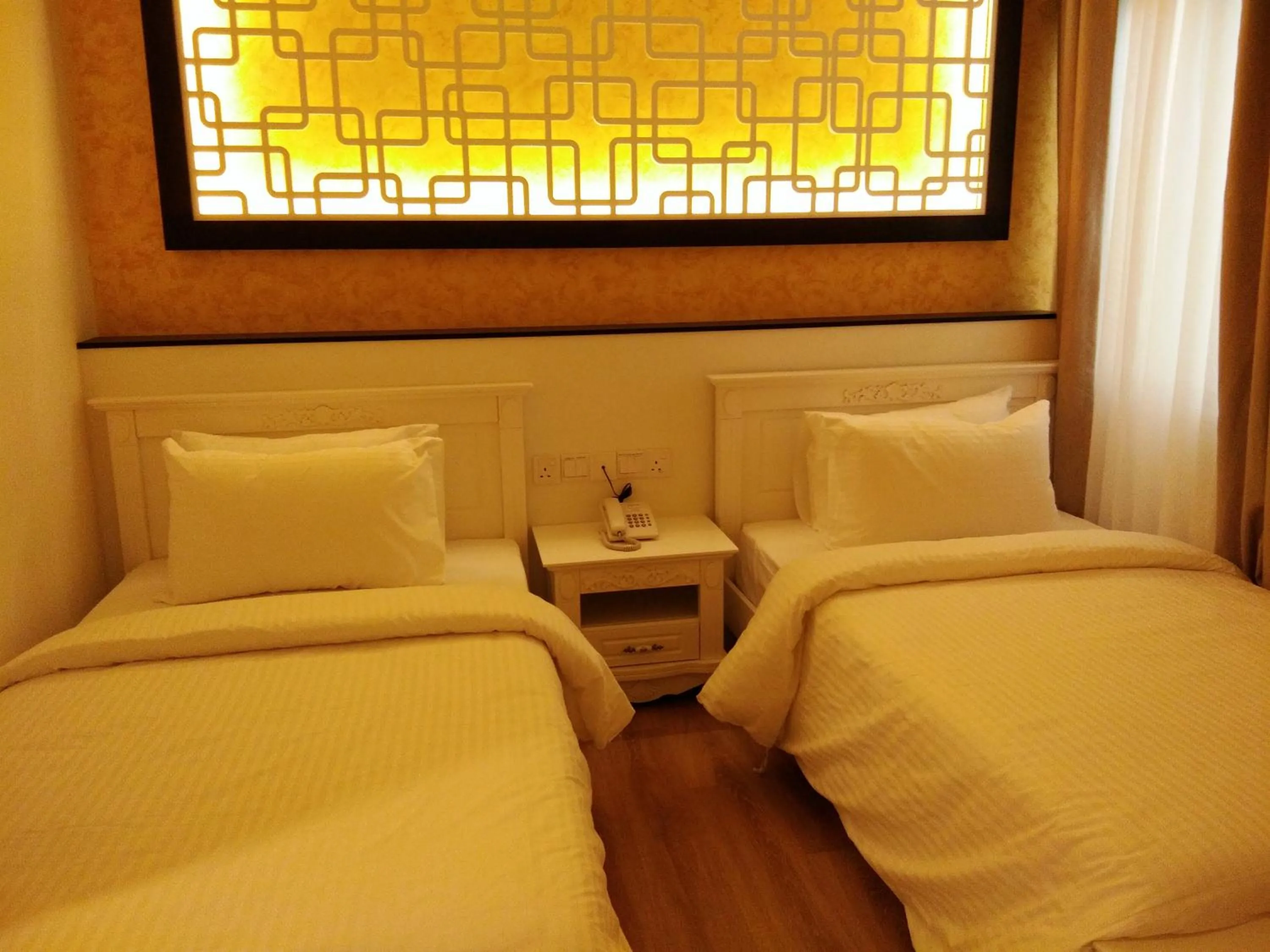 Bed in Wifi Boutique Hotel