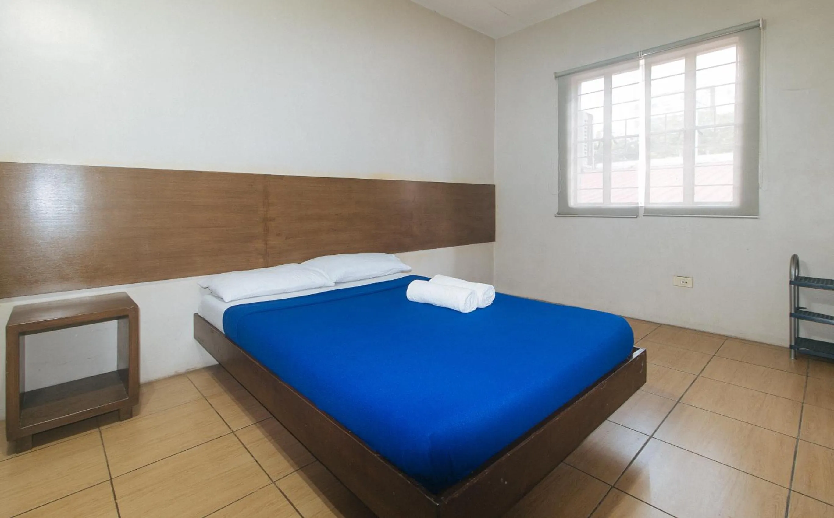 Bed in Metro Deluxe Residences near World Trade Center